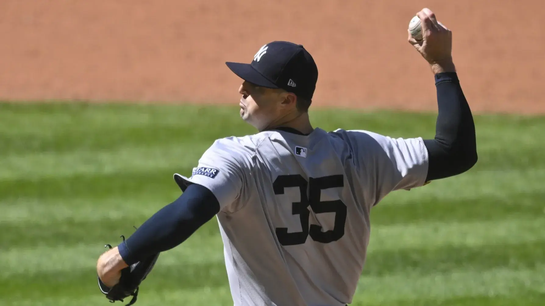 Apr 13, 2024; Cleveland, Ohio, USA; New York Yankees pitcher Clay Holmes (35) delivers a pitch in the ninth inning against the Cleveland Guardians at Progressive Field. / David Richard-USA TODAY Sports