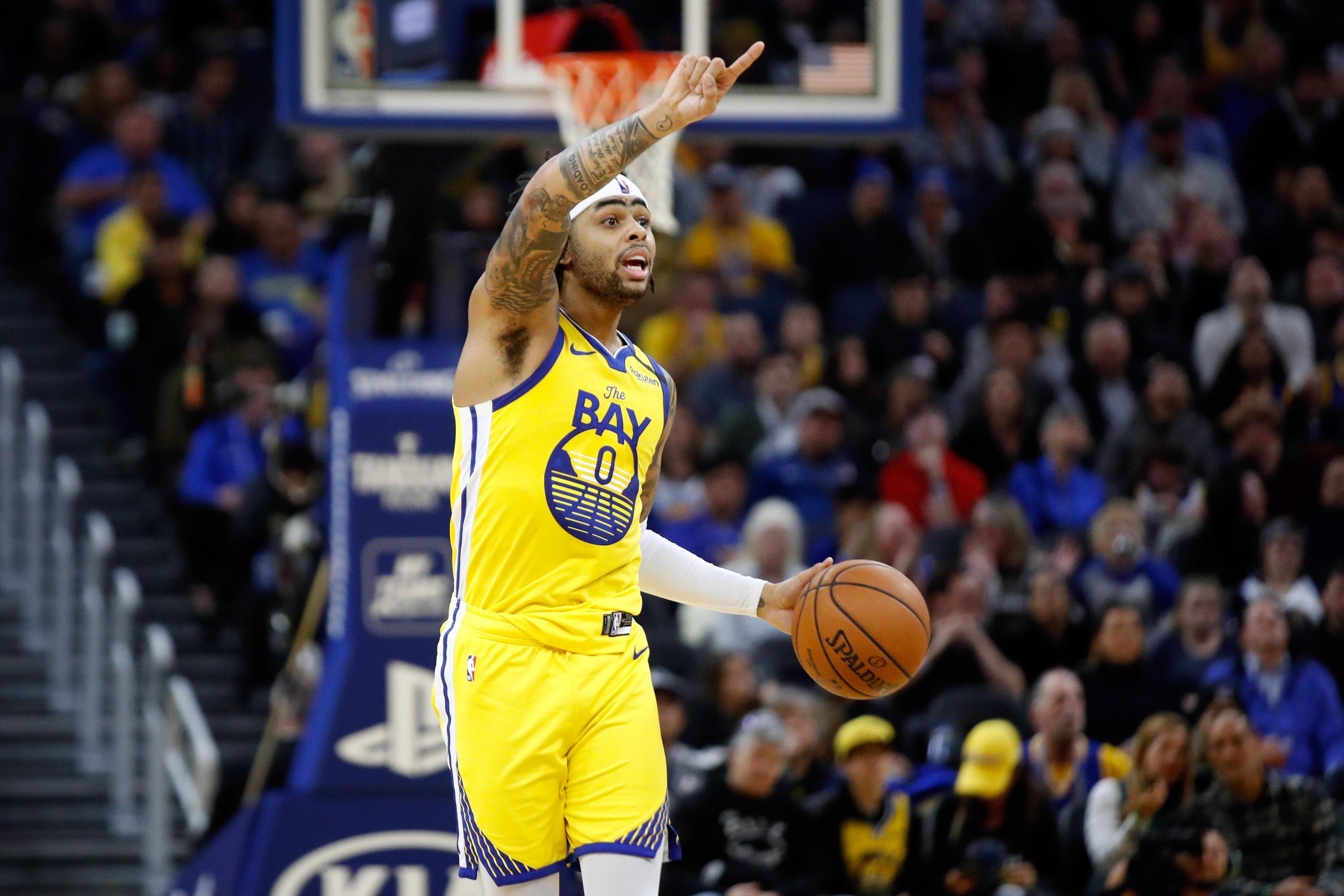 Jan 18, 2020; San Francisco, California, USA; Golden State Warriors guard D'Angelo Russell (0) gestures while dribbling during the third quarter against the Orlando Magic at Chase Center. Mandatory Credit: Darren Yamashita-USA TODAY Sports / Darren Yamashita