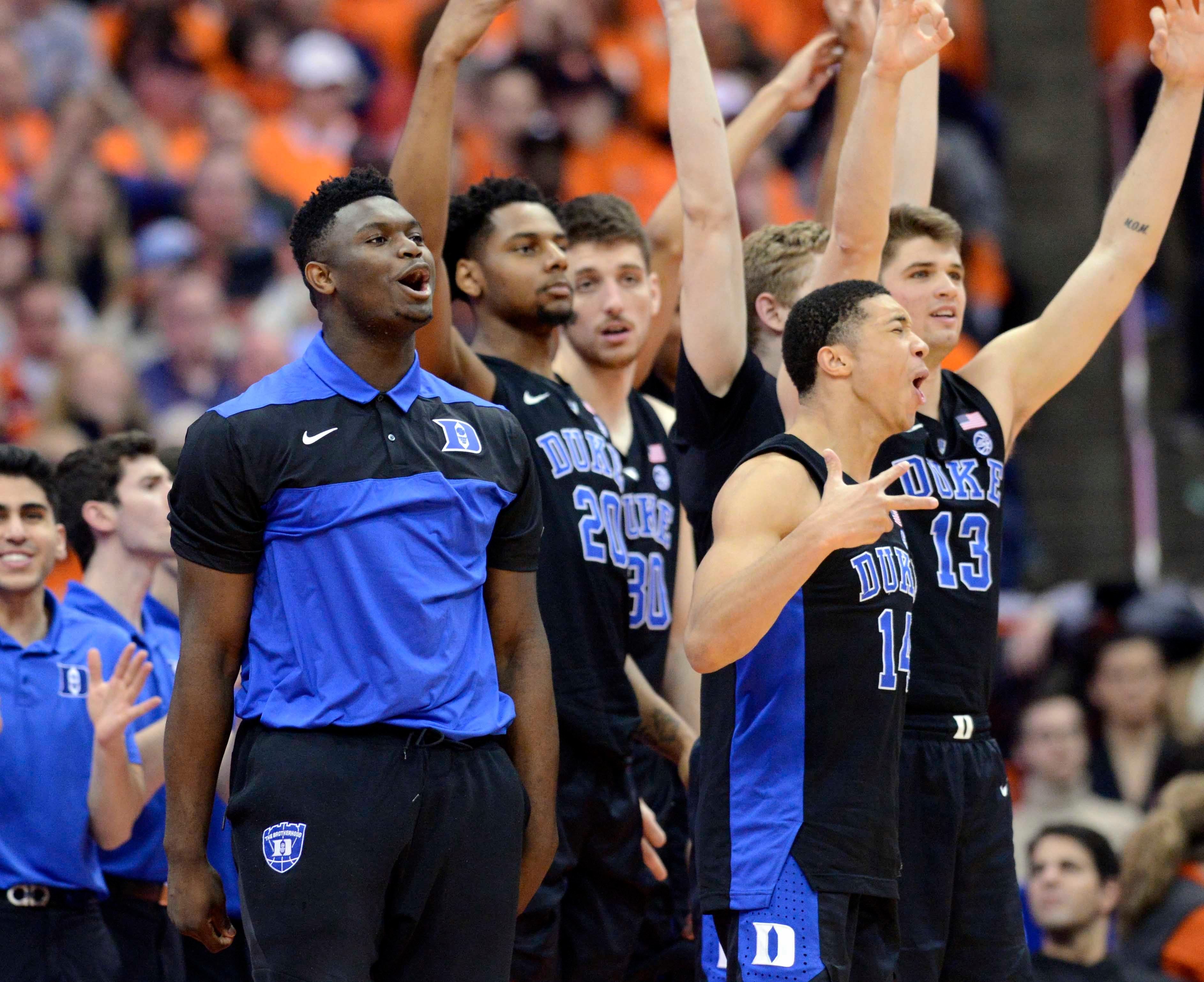 Feb 23, 2019; Syracuse, NY, USA; Duke Blue Devils forward Zion Williamson (left) and his team mates react to making a basket in the second half against the Syracuse Orange at the Carrier Dome. Mandatory Credit: Mark Konezny-USA TODAY Sports