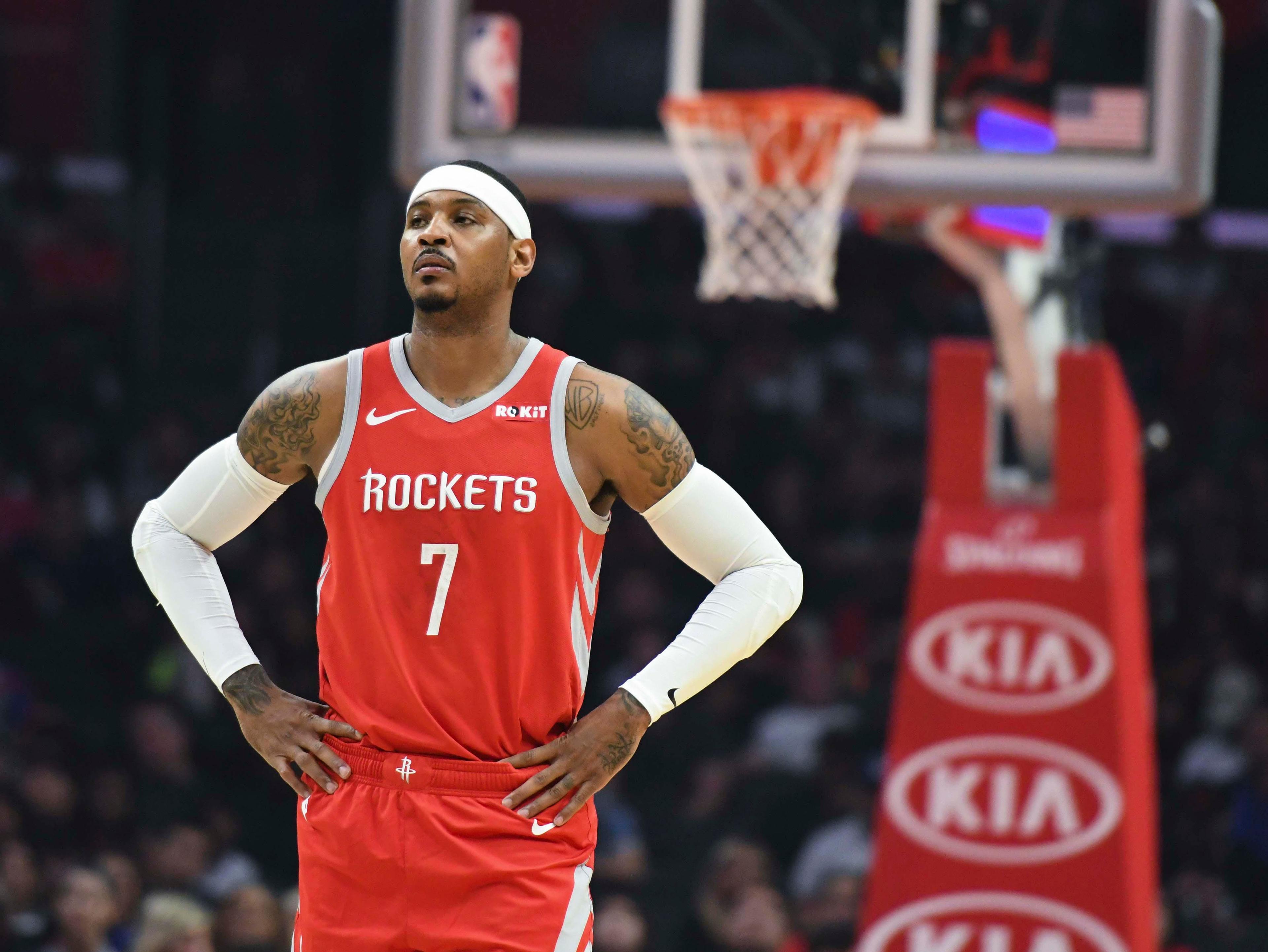 Houston Rockets forward Carmelo Anthony watches a teammate shoot free throws during the second quarter against the LA Clippers at Staples Center. / Robert Hanashiro/USA TODAY Sports