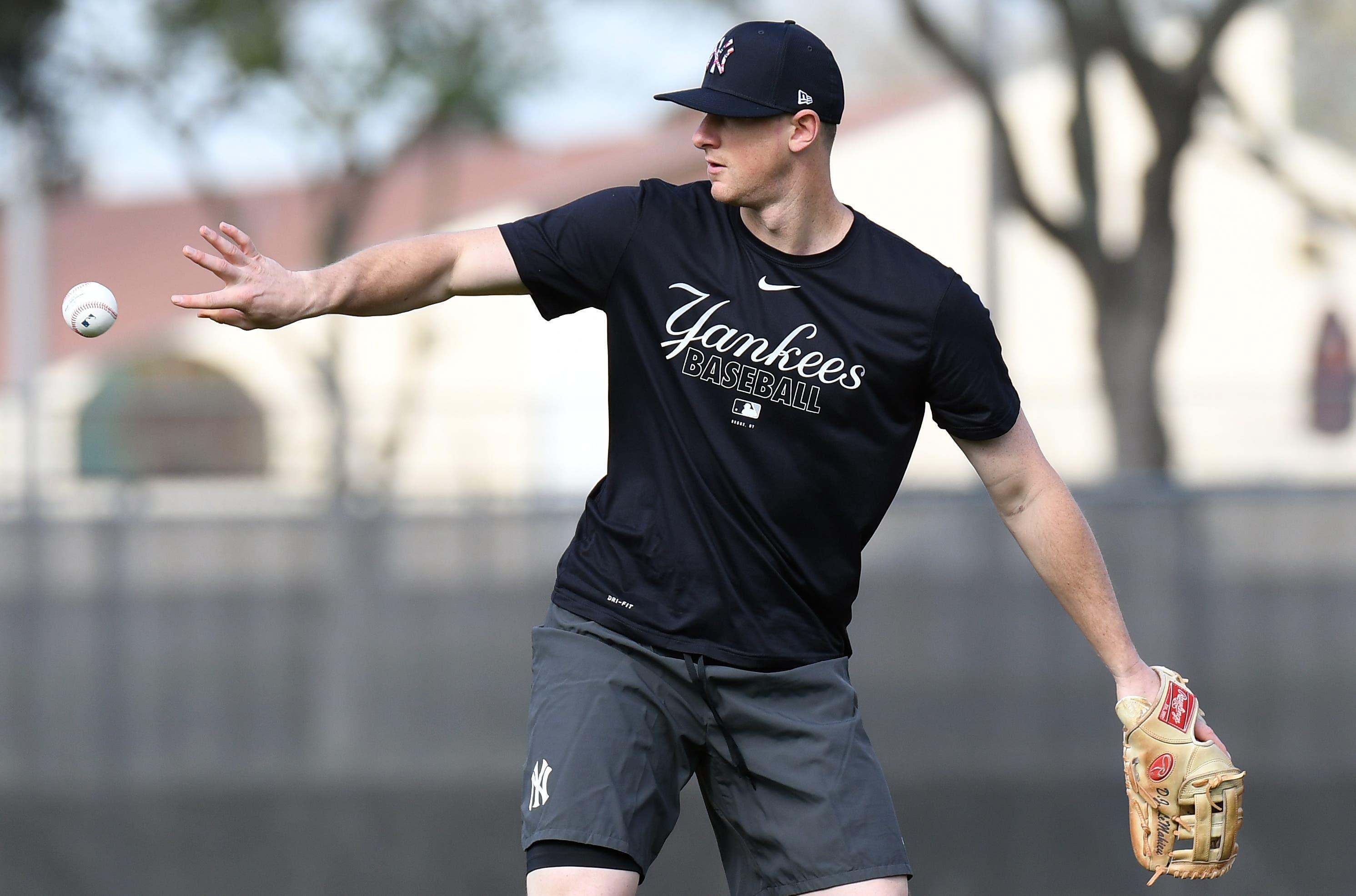 Feb 17, 2020; Tampa, Florida, USA; New York Yankees infielder DJ LeMahieu (26) tosses the ball towards second base during spring training at George M. Steinbrenner Field. Mandatory Credit: Jonathan Dyer-USA TODAY Sports / Jonathan Dyer