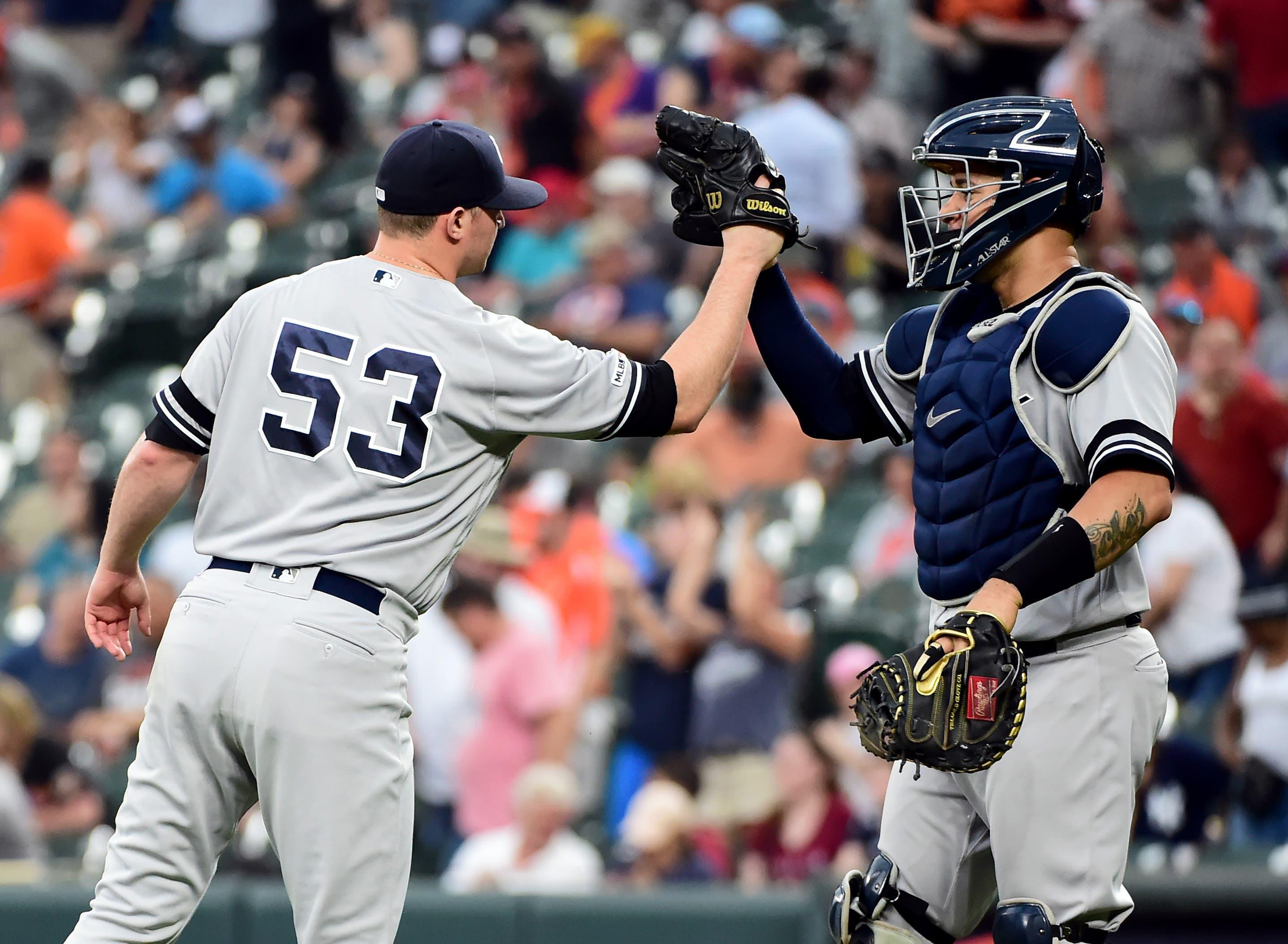 May 23, 2019; Baltimore, MD, USA; New York Yankees pitcher Zack Britton (53) high fives catcher Gary Sanchez (24) after beating the Baltimore Orioles 6-5 at Oriole Park at Camden Yards. Mandatory Credit: Evan Habeeb-USA TODAY Sports / Evan Habeeb