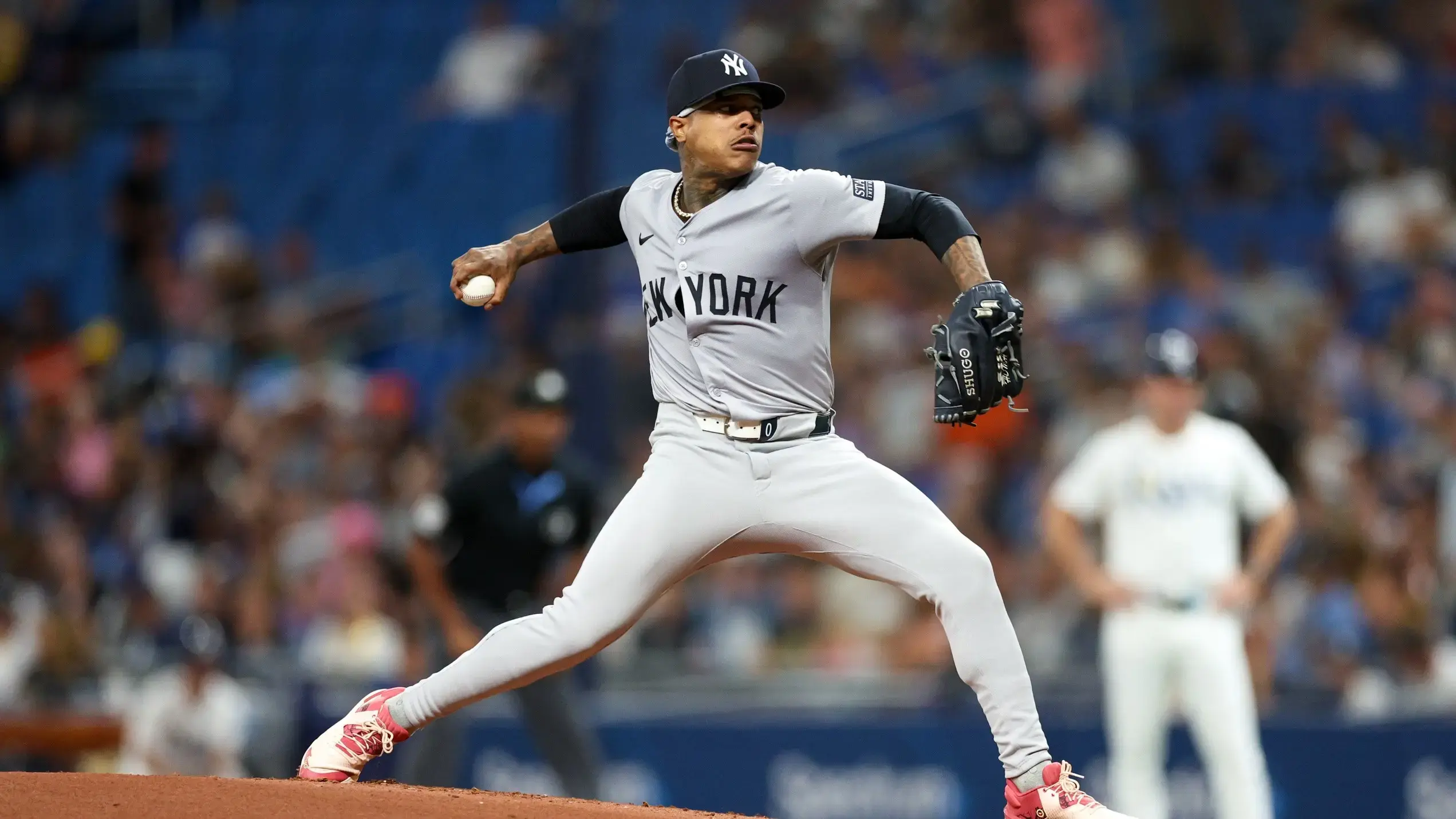 Jul 10, 2024; St. Petersburg, Florida, USA; New York Yankees pitcher Marcus Stroman (0) throws a pitch against the Tampa Bay Rays in the first inning at Tropicana Field. / Nathan Ray Seebeck-USA TODAY Sports