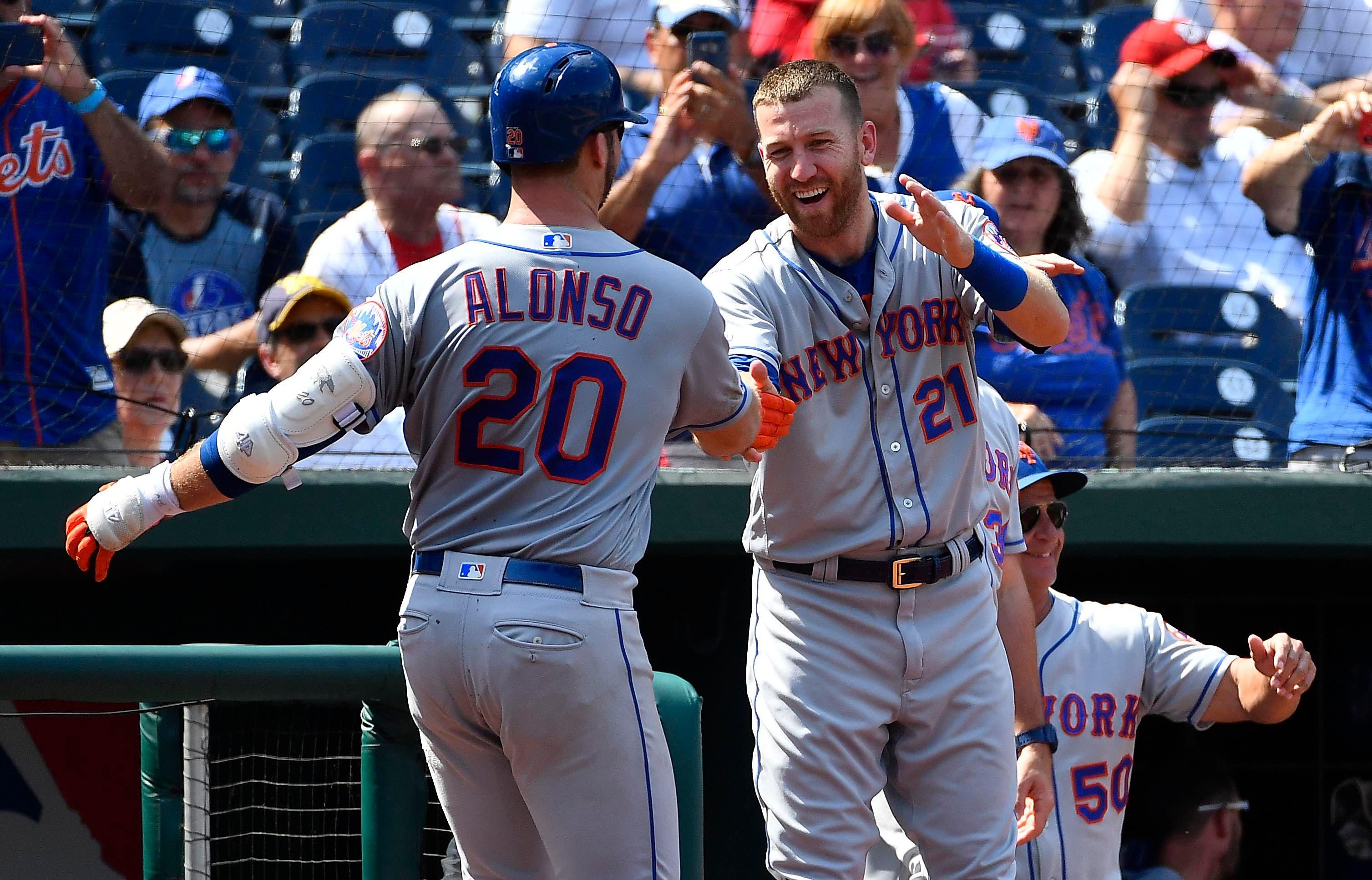 Sep 4, 2019; Washington, DC, USA; New York Mets first baseman Pete Alonso (20) is congratulated by third baseman Todd Frazier (21) after hitting a solo home run against the Washington Nationals during the fifth inning at Nationals Park. Mandatory Credit: Brad Mills-USA TODAY Sports / Brad Mills