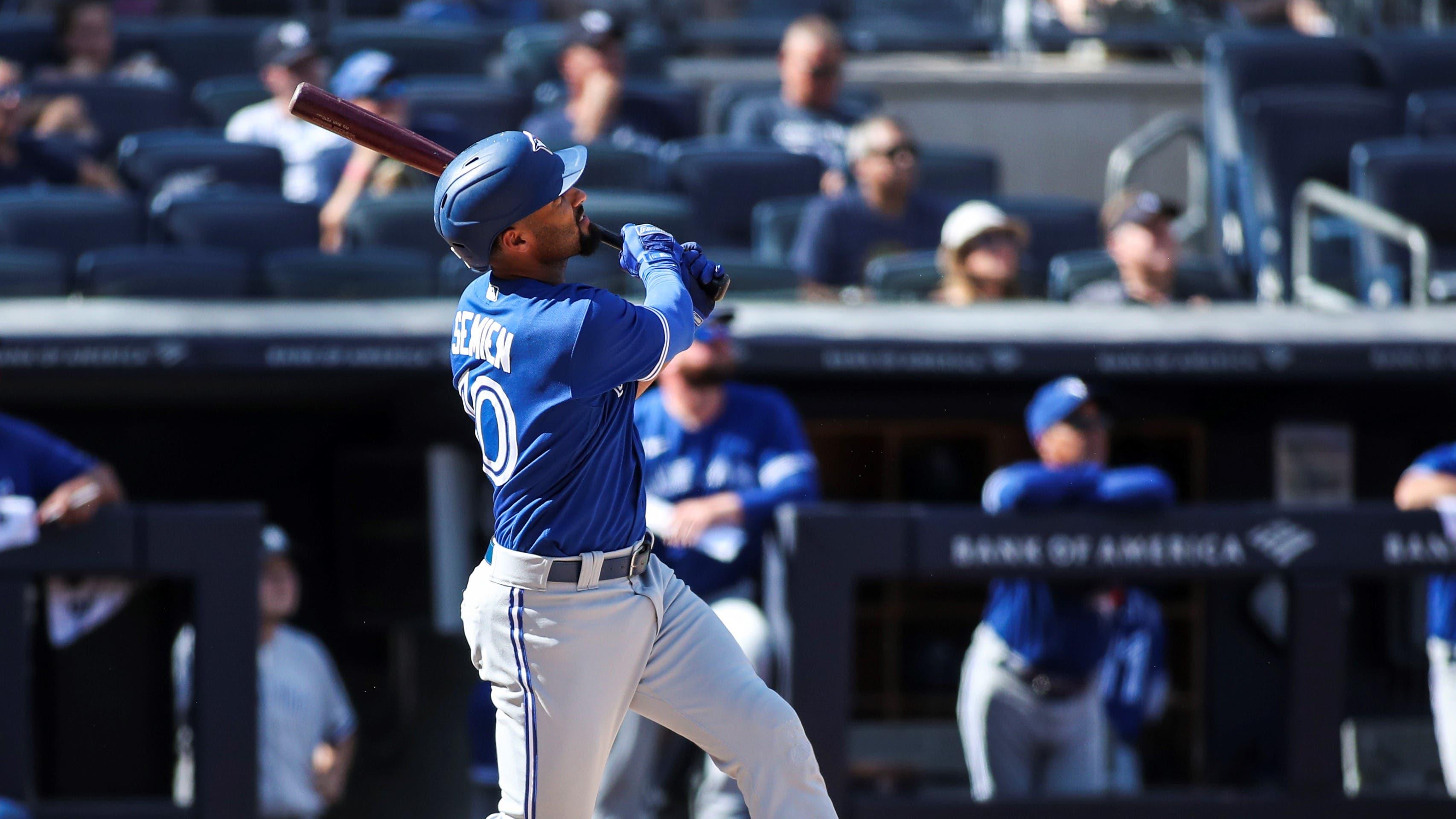 Sep 6, 2021; Bronx, New York, USA; Toronto Blue Jays second baseman Marcus Semien (10) hits a grand slam home run in the ninth inning against the New York Yankees at Yankee Stadium. Mandatory Credit: Wendell Cruz-USA TODAY Sports / Wendell Cruz-USA TODAY Sports