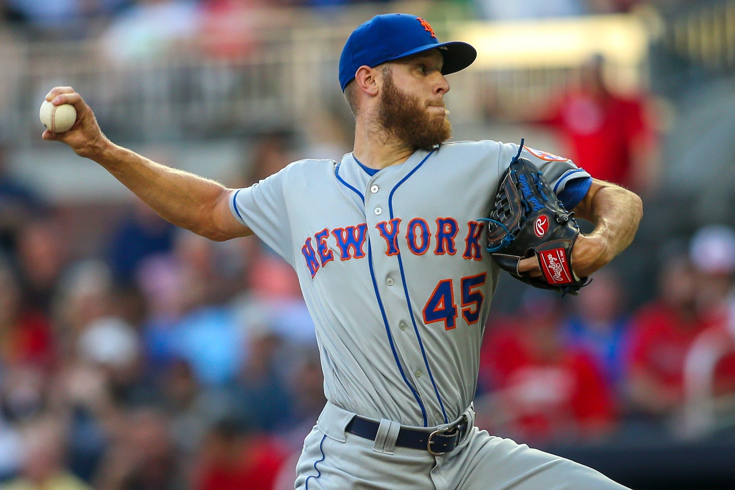 Aug 13, 2019; Atlanta, GA, USA; New York Mets starting pitcher Zack Wheeler (45) throws against the Atlanta Braves in the first inning at SunTrust Park. Mandatory Credit: Brett Davis-USA TODAY Sports / Brett Davis