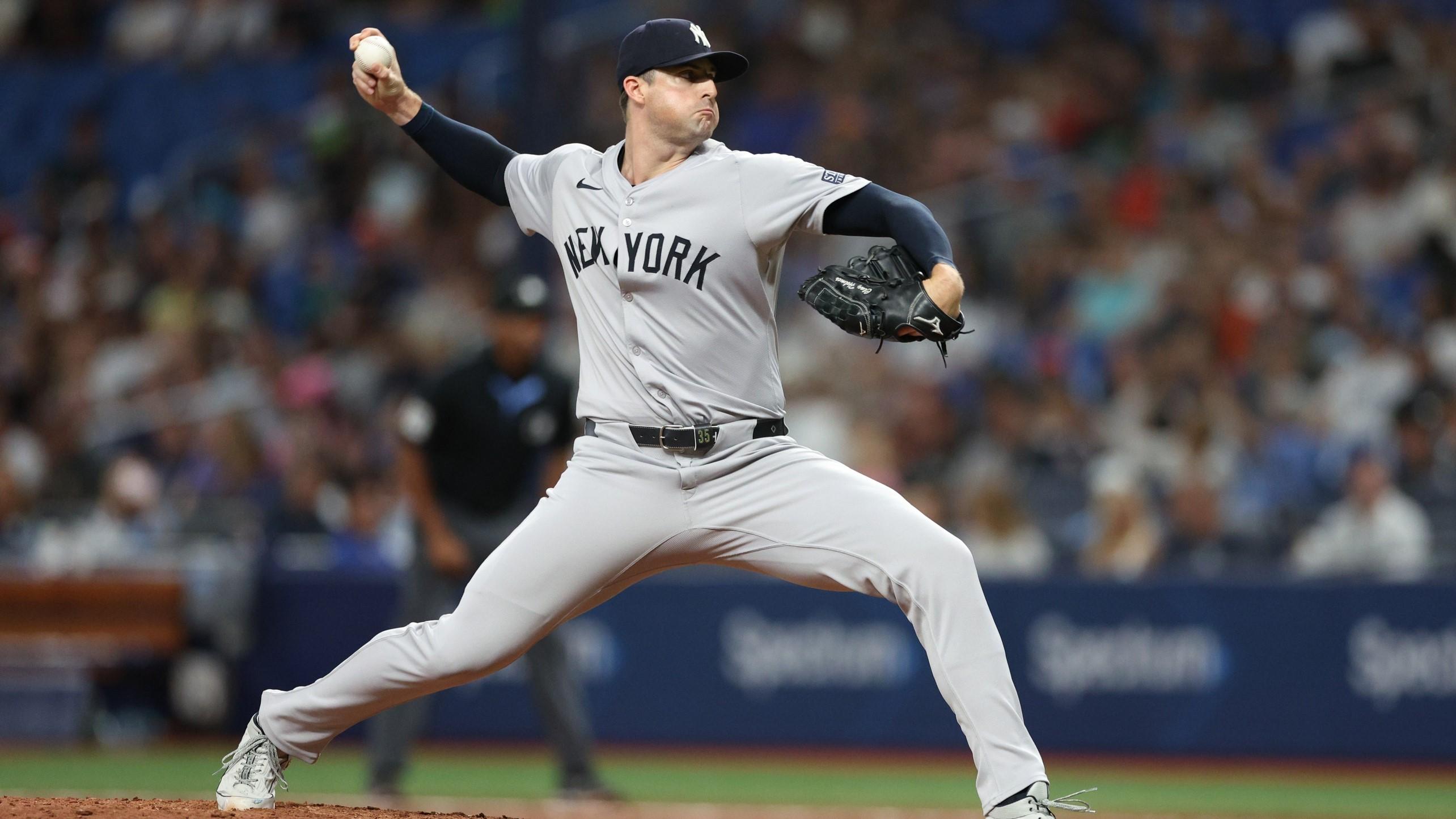 Jul 10, 2024; St. Petersburg, Florida, USA; New York Yankees pitcher Clay Holmes (35) throws a pitch against the Tampa Bay Rays in the eighth inning at Tropicana Field. 