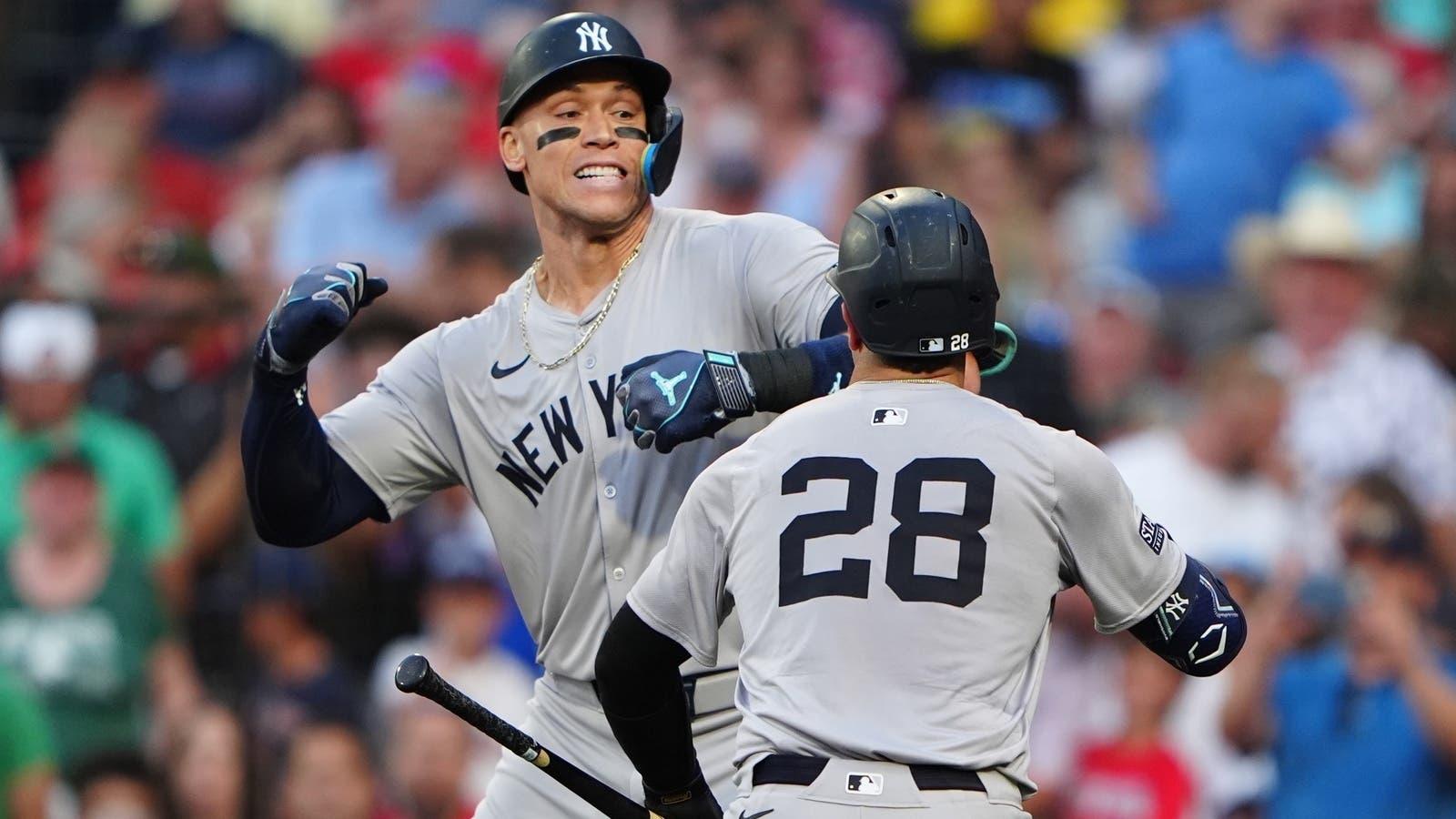 New York Yankees catcher Austin Wells (28) congratulates New York Yankees designated hitter Aaron Judge (99) for hitting a home run during the first inning at Fenway Park. / Gregory Fisher-USA TODAY Sports