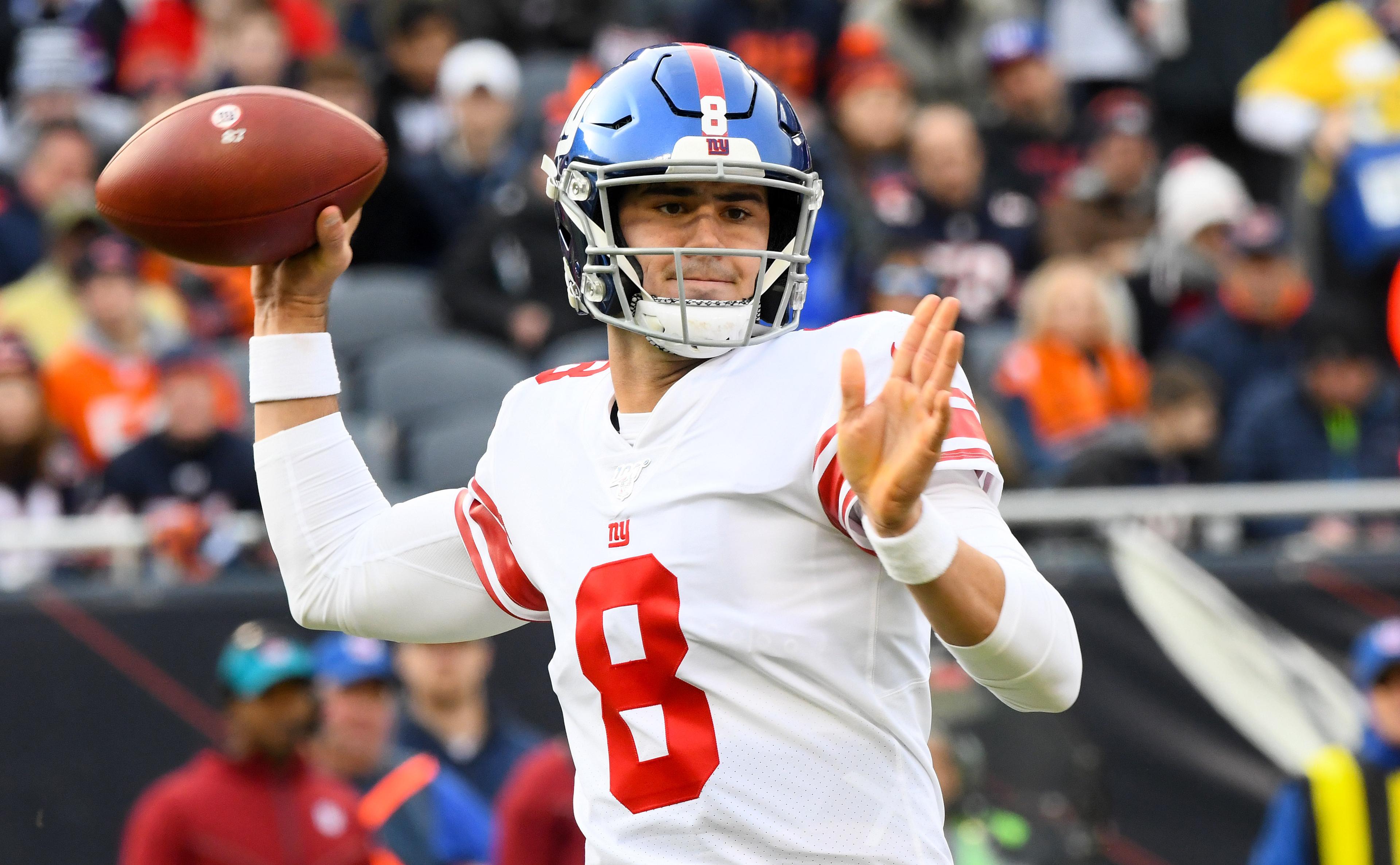 Nov 24, 2019; Chicago, IL, USA; New York Giants quarterback Daniel Jones (8) drops back too pass against the Chicago Bears during the second half at Soldier Field. Mandatory Credit: Mike DiNovo-USA TODAY Sports