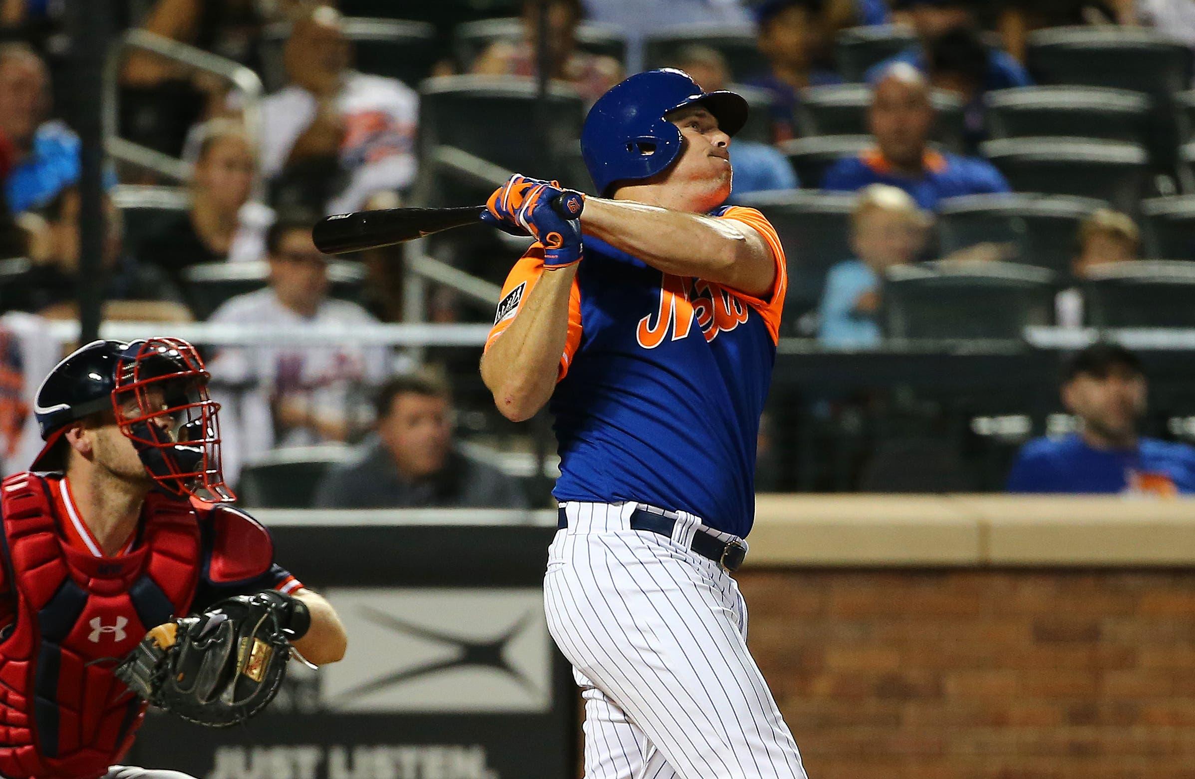 Aug 24, 2018; New York City, NY, USA; New York Mets right fielder Jay Bruce (19) hits a two run home run against the Washington Nationals during the eighth inning at Citi Field. Mandatory Credit: Andy Marlin-USA TODAY Sports / Andy Marlin