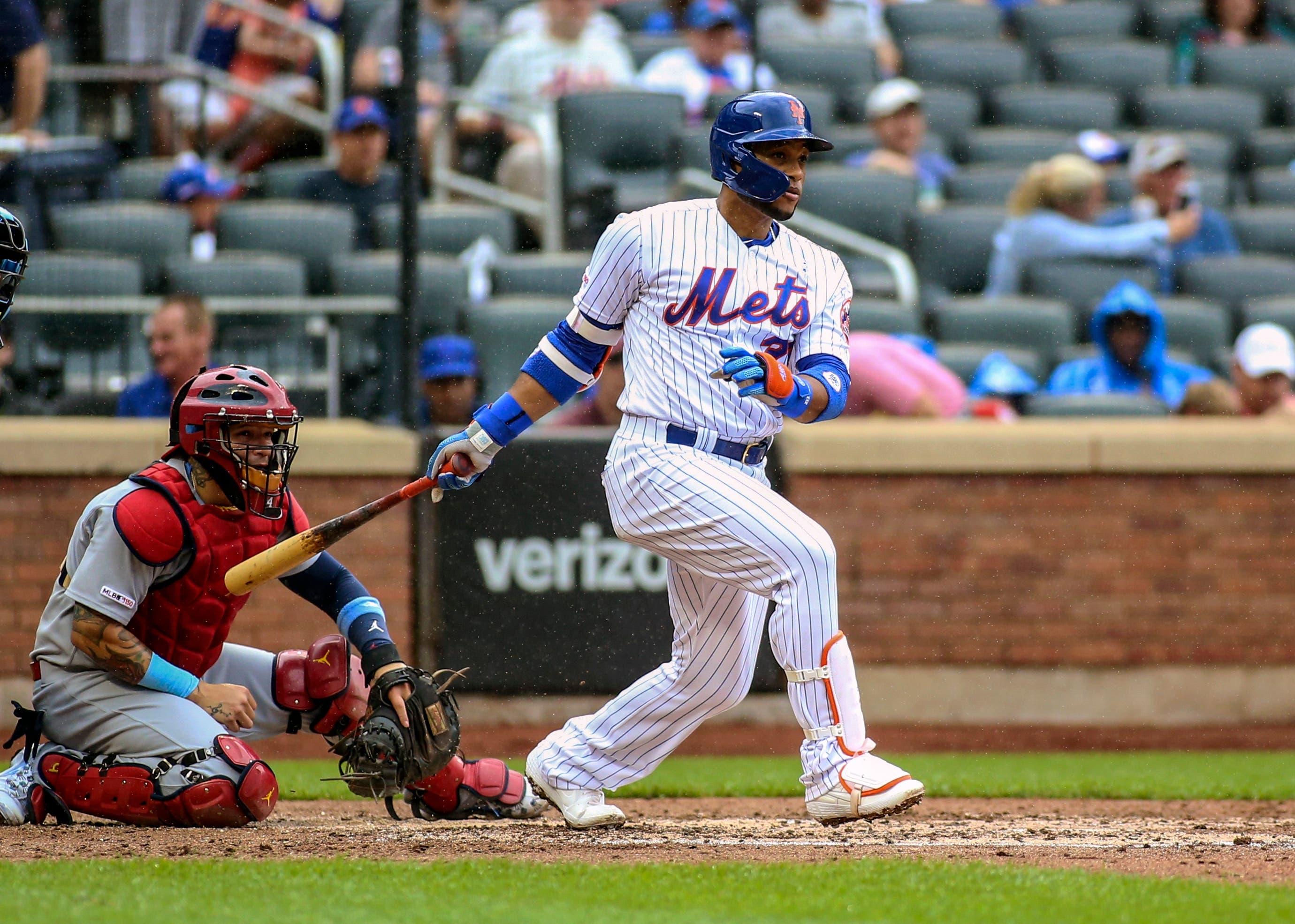 Jun 16, 2019; New York City, NY, USA; New York Mets second baseman Robinson Cano (24) hits a double against the St. Louis Cardinals in the third inning at Citi Field. Mandatory Credit: Wendell Cruz-USA TODAY Sports / Wendell Cruz