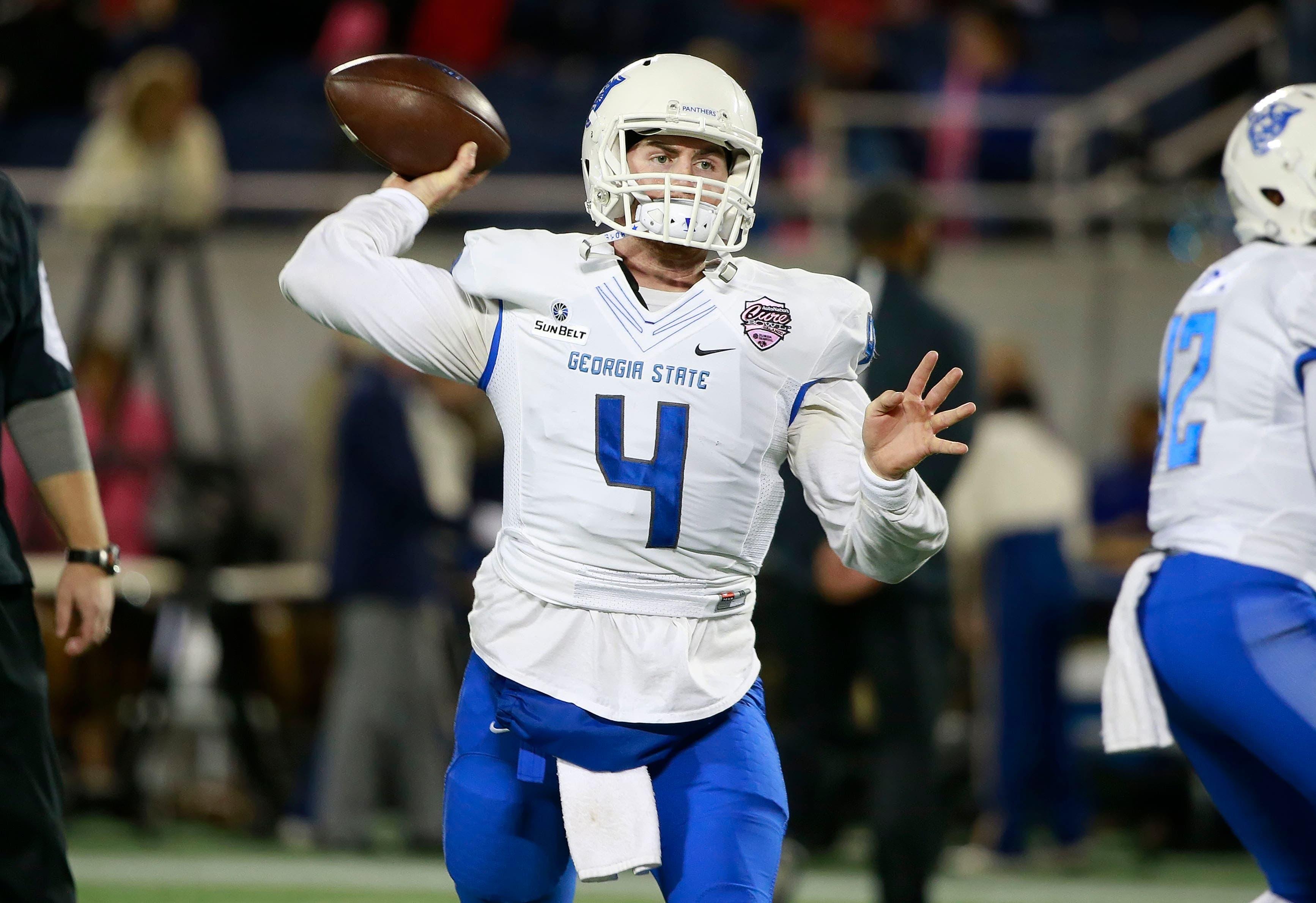 Dec 19, 2015; Orlando, FL, USA; Georgia State Panthers quarterback Nick Arbuckle (4) works out prior to the game in the 2015 Cure Bowl against the San Jose State Spartans at Citrus Bowl Stadium. Mandatory Credit: Kim Klement-USA TODAY Sports / Kim Klement