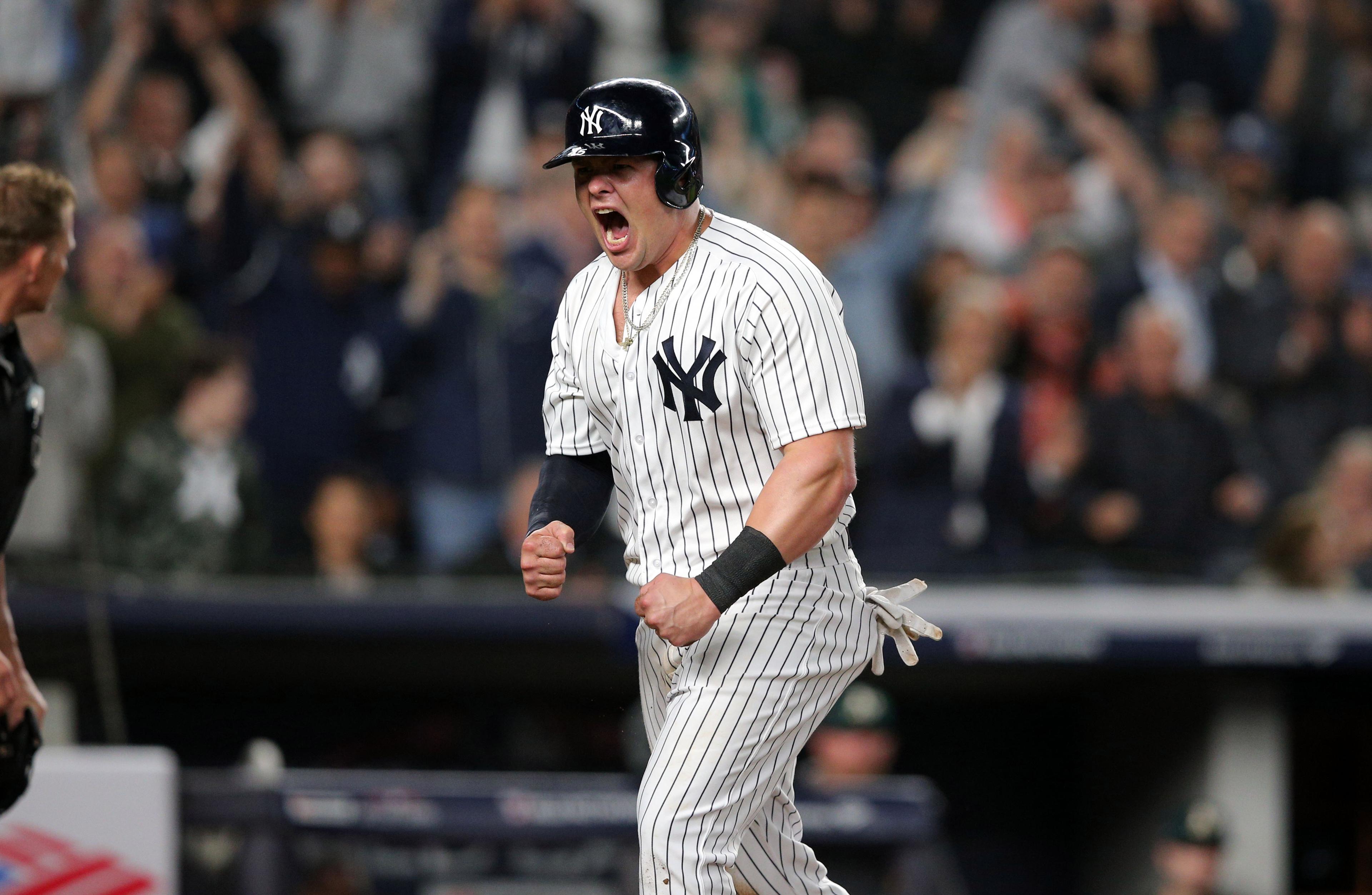 'We Want Boston!' Fans roar as Yankees beat A's to set date with Red Sox