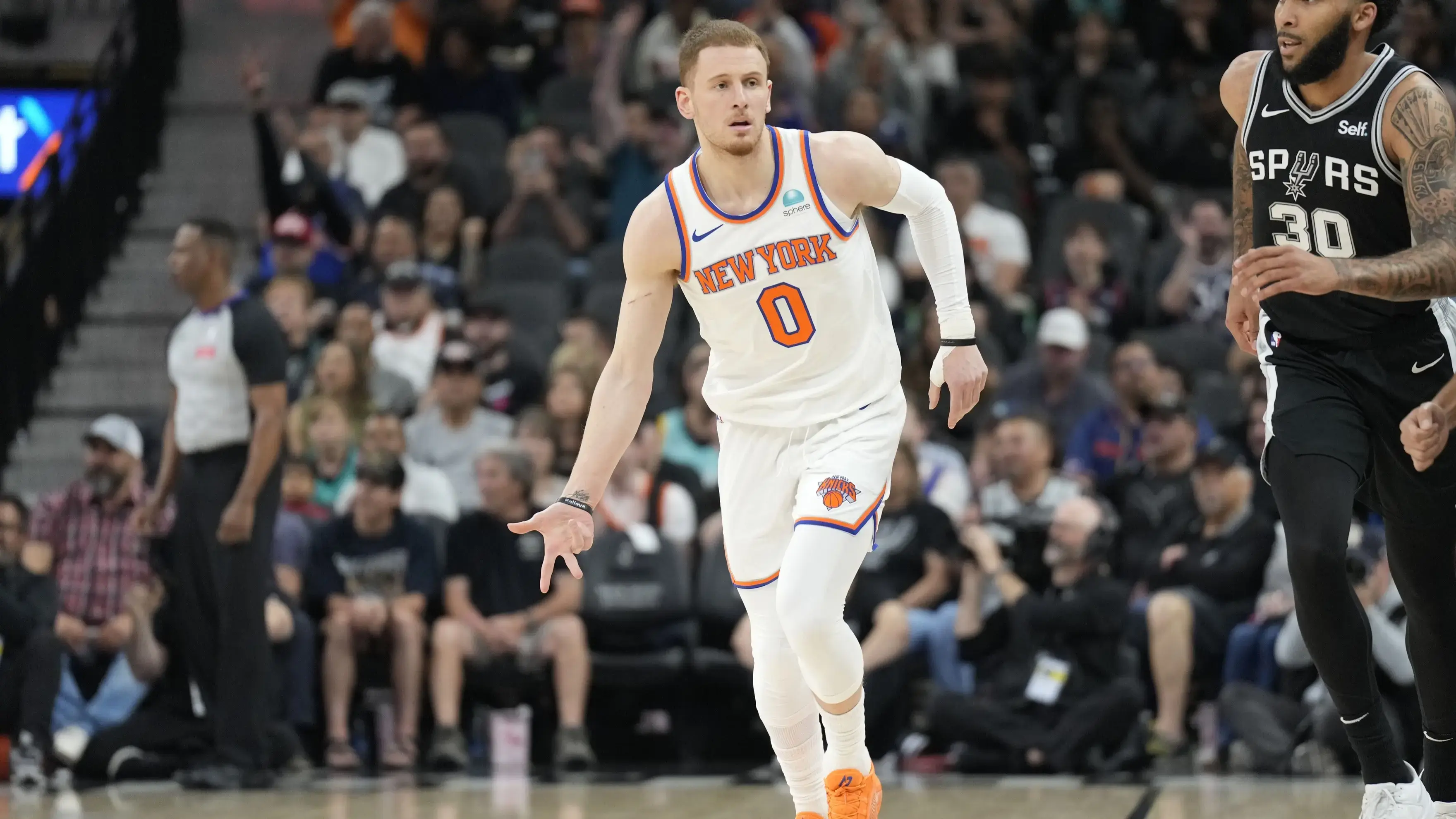 Mar 29, 2024; San Antonio, Texas, USA; New York Knicks guard Donte DiVincenzo (0) reacts after scoring a three point basket during the first half against the San Antonio Spurs at Frost Bank Center. / Scott Wachter-USA TODAY Sports