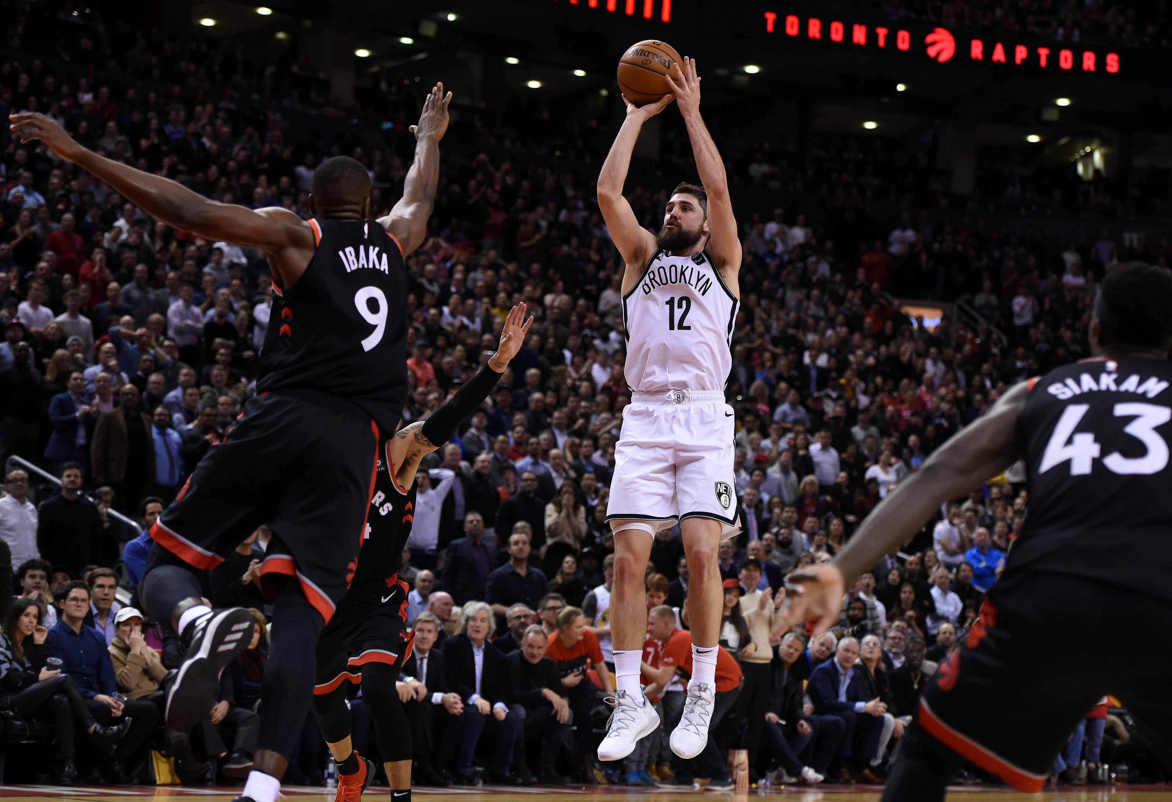 Feb 11, 2019; Toronto, Ontario, CAN; Brooklyn Nets forward Joe Harris (12) shoots for a basket against Toronto Raptors in the second half at Scotiabank Arena. Mandatory Credit: Dan Hamilton-USA TODAY Sports / Dan Hamilton