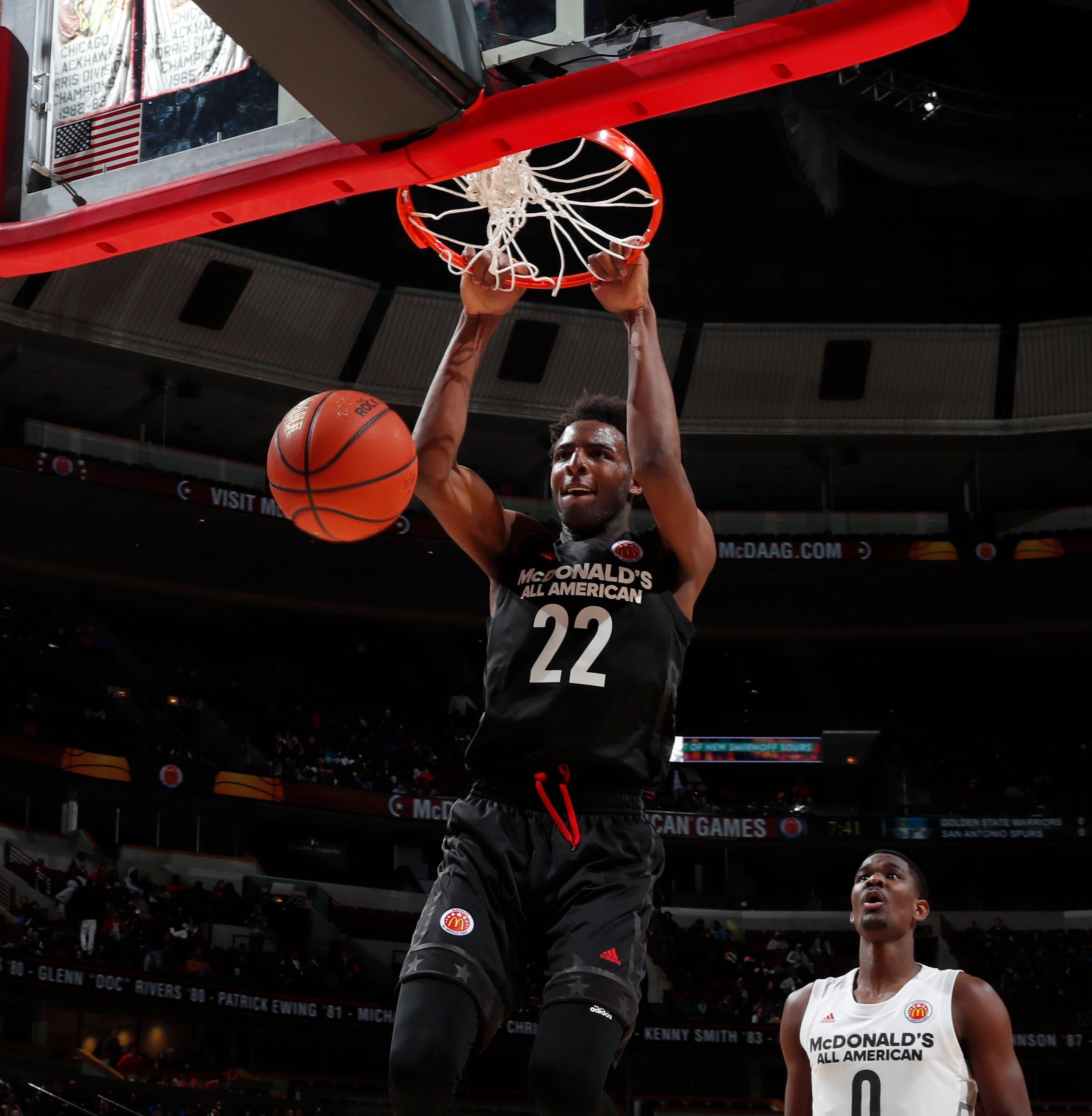 Mar 29, 2017; Chicago, IL, USA; McDonalds All-American East center Mitchell Robinson (22) dunks during the 40th Annual McDonald's High School All-American Game at the United Center. Mandatory Credit: Brian Spurlock-USA TODAY Sports / Brian Spurlock