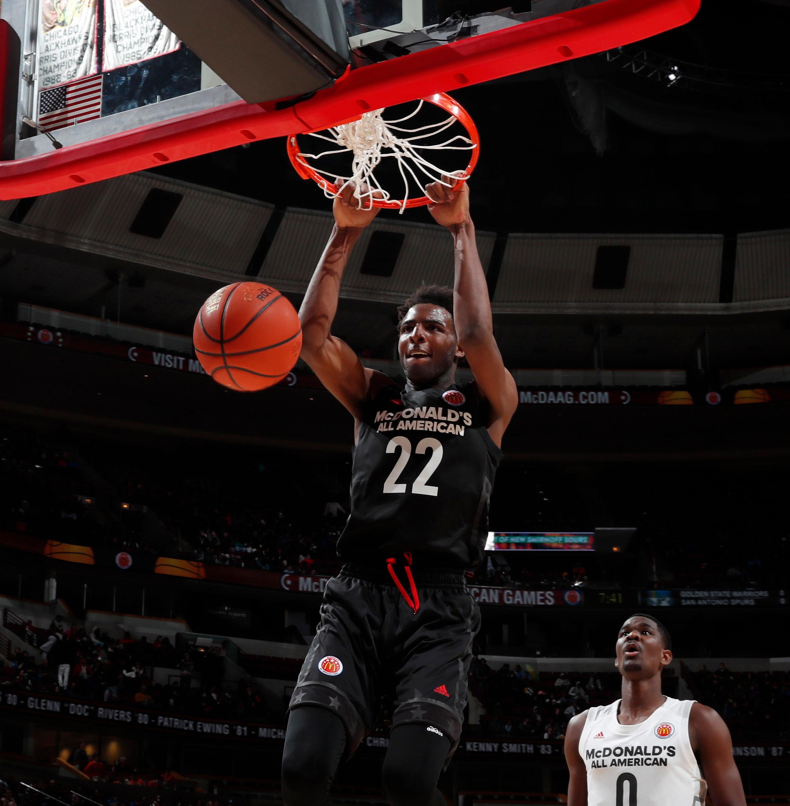 Mar 29, 2017; Chicago, IL, USA; McDonalds All-American East center Mitchell Robinson (22) dunks during the 40th Annual McDonald's High School All-American Game at the United Center. Mandatory Credit: Brian Spurlock-USA TODAY Sports