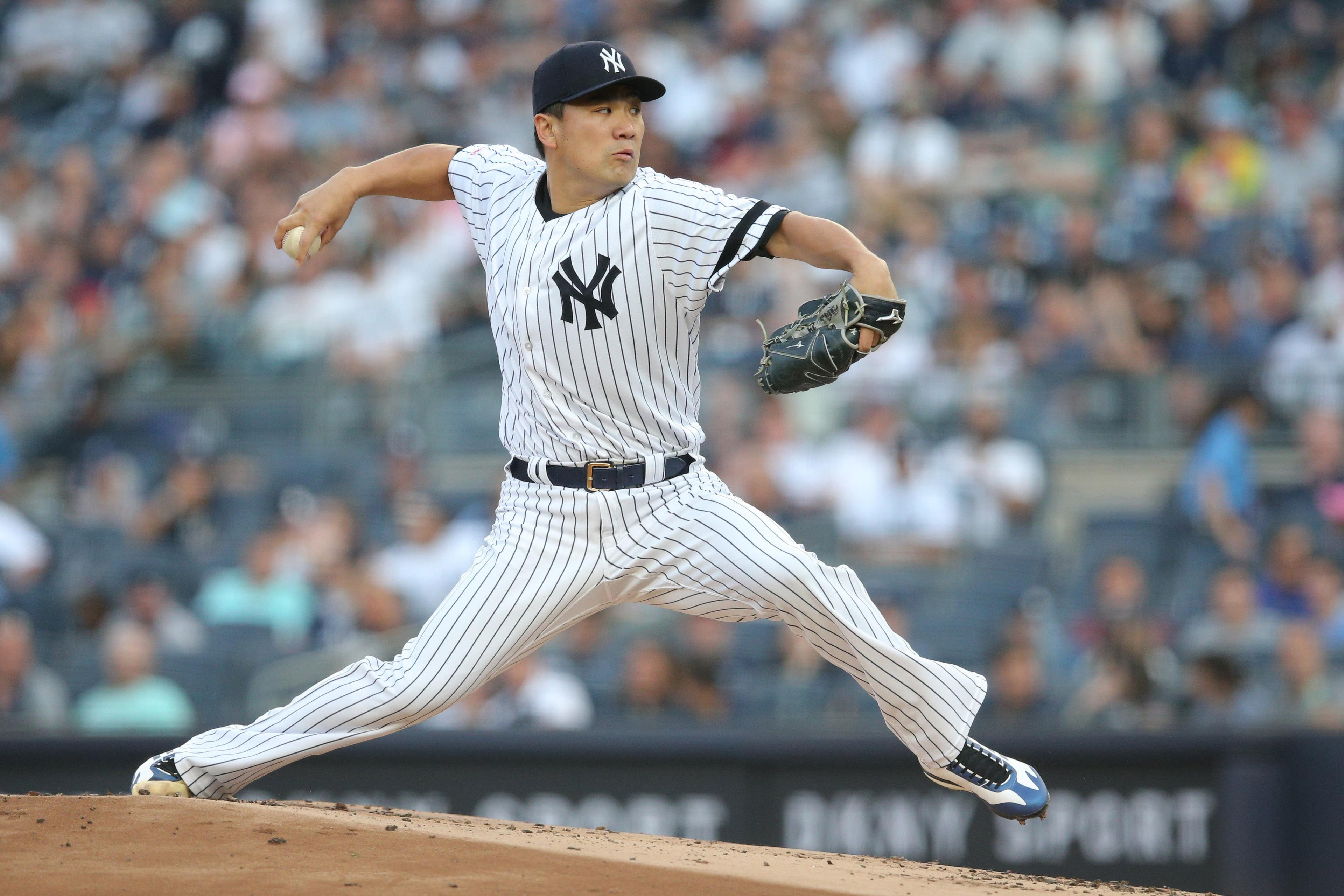 Jun 22, 2019; Bronx, NY, USA; New York Yankees starting pitcher Masahiro Tanaka (19) pitches against the Houston Astros during the first inning at Yankee Stadium. Mandatory Credit: Brad Penner-USA TODAY Sports / Brad Penner