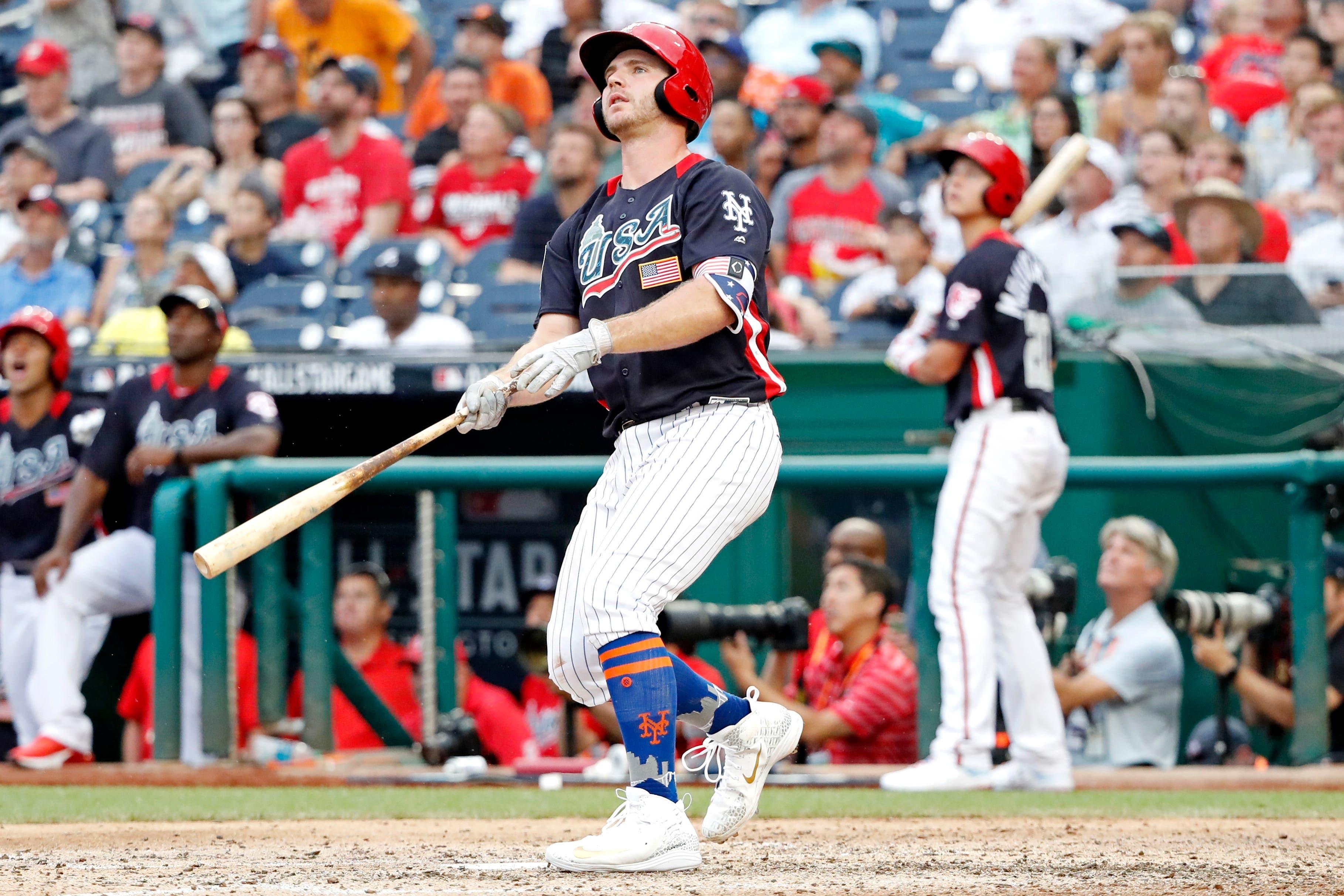 Jul 15, 2018; Washington, DC, USA; USA infielder Peter Alonso (34) hits a two run home run in seventh inning against the World Team during the 2018 All Star Futures Game at Nationals Ballpark. Mandatory Credit: Geoff Burke-USA TODAY Sports / Geoff Burke