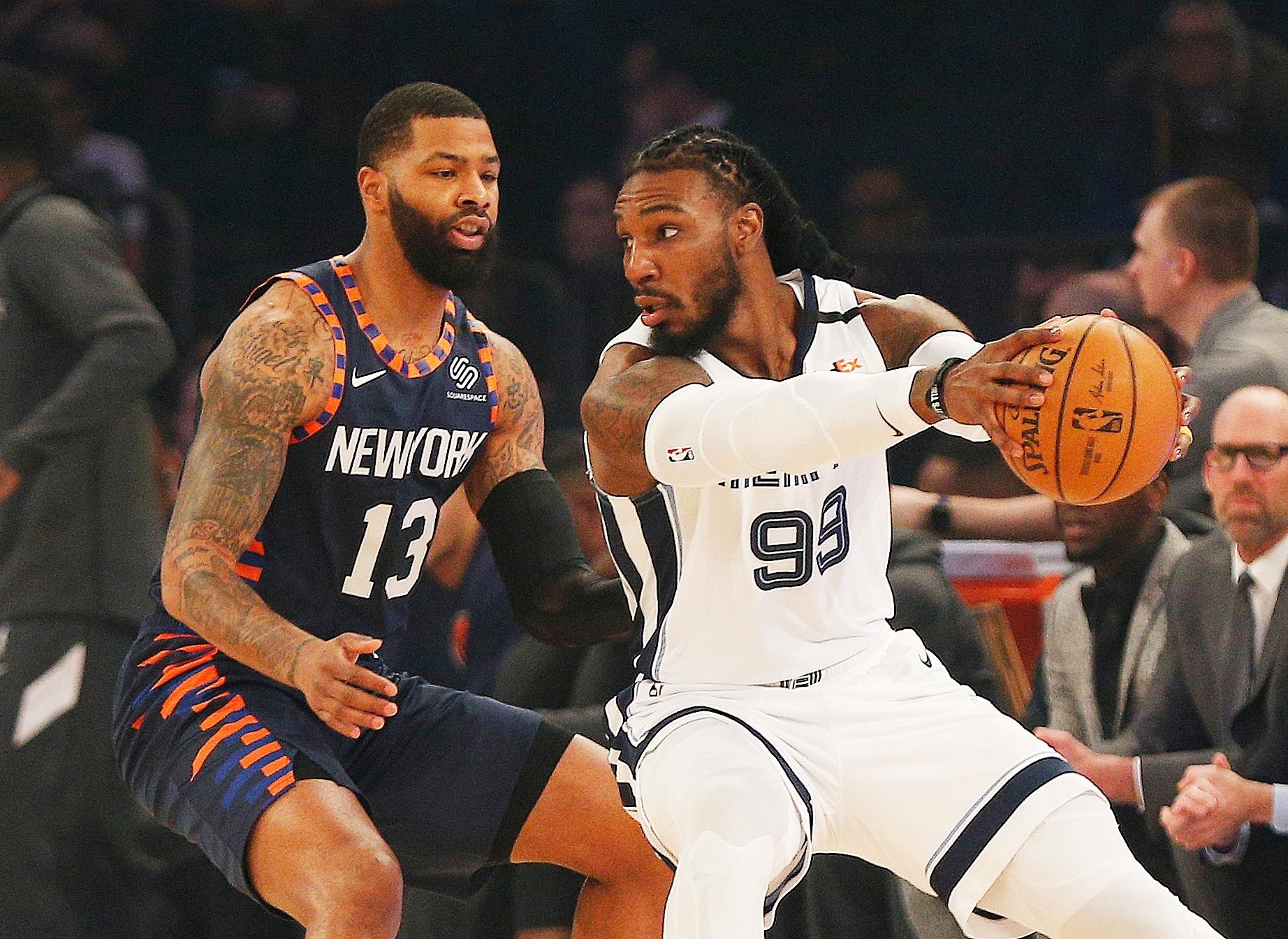 Jan 29, 2020; New York, New York, USA;Memphis Grizzlies forward Jae Crowder (99) dribbles the ball against New York Knicks forward Marcus Morris Sr. (13) during the first half at Madison Square Garden. Mandatory Credit: Andy Marlin-USA TODAY Sports