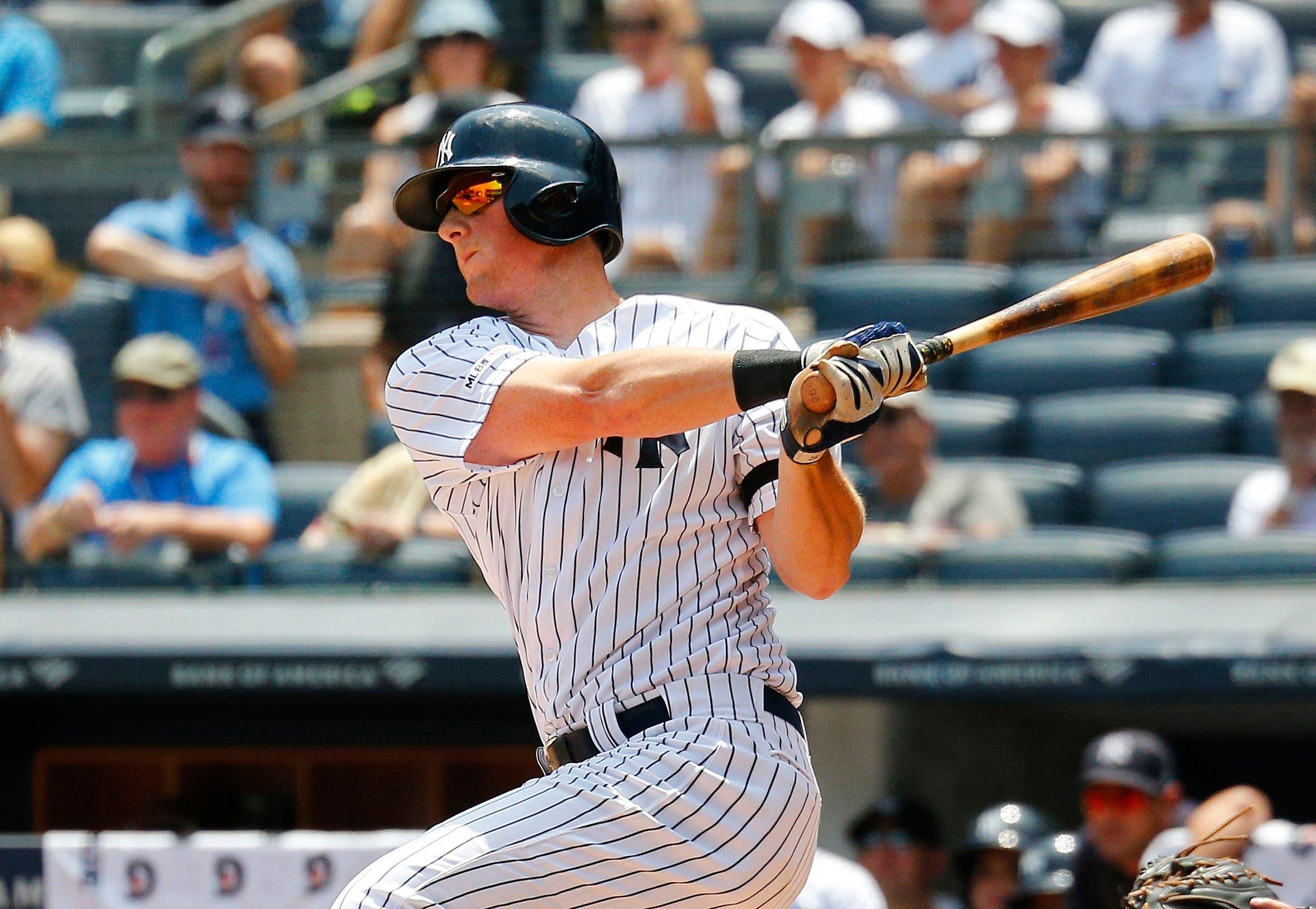 Jul 20, 2019; Bronx, NY, USA New York Yankees third baseman DJ LeMahieu (26) singles against the Colorado Rockies during the first inning at Yankee Stadium. Mandatory Credit: Andy Marlin-USA TODAY Sports / Andy Marlin