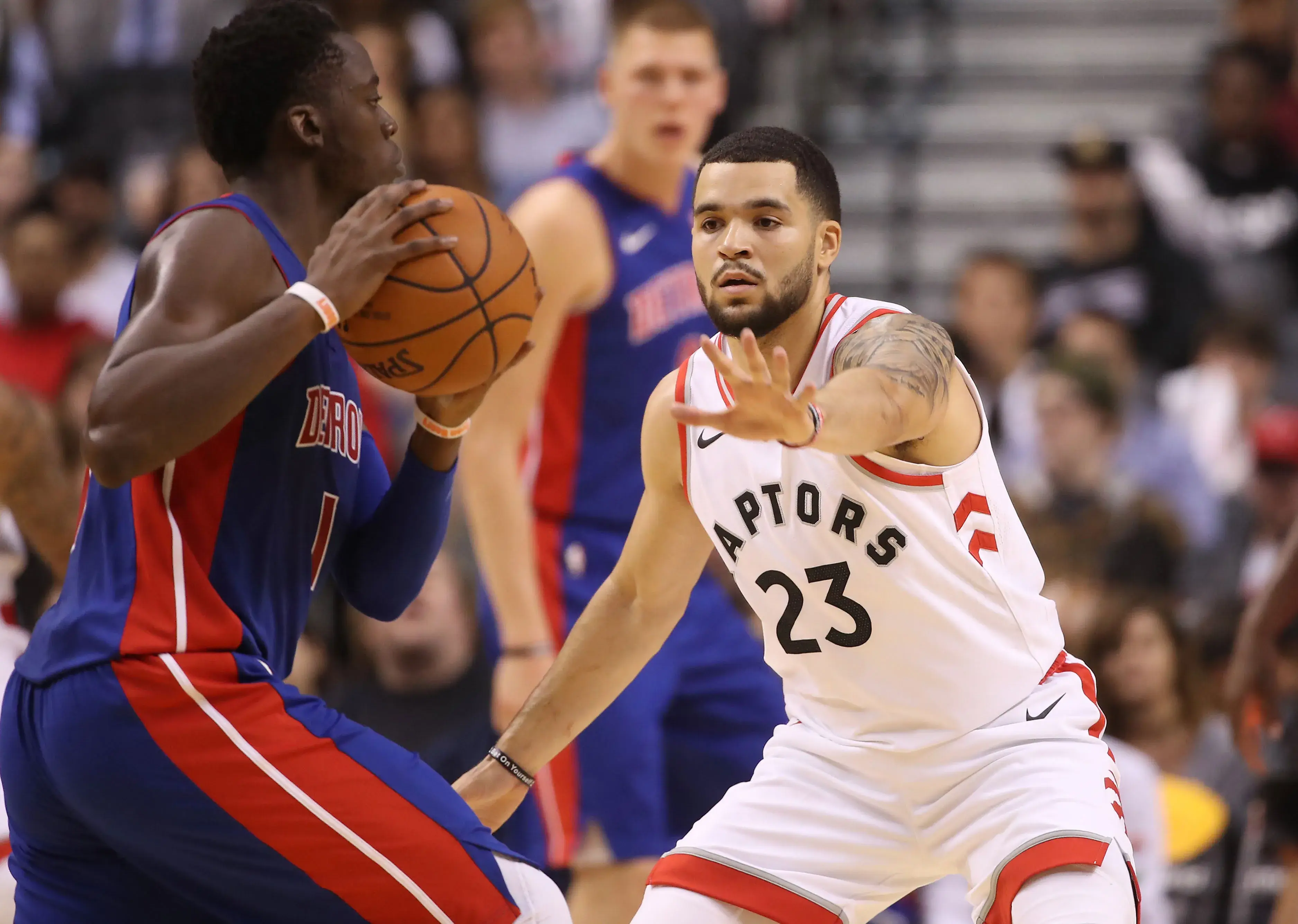 Oct 10, 2017; Toronto, Ontario, CAN; Toronto Raptors guard Fred VanVleet (23) plays defense against Detroit Pistons point guard Reggie Jackson (1) at Air Canada Centre. The Raptors beat the Pistons 116-94. Mandatory Credit: Tom Szczerbowski-USA TODAY Sports / © Tom Szczerbowski-USA TODAY Sports