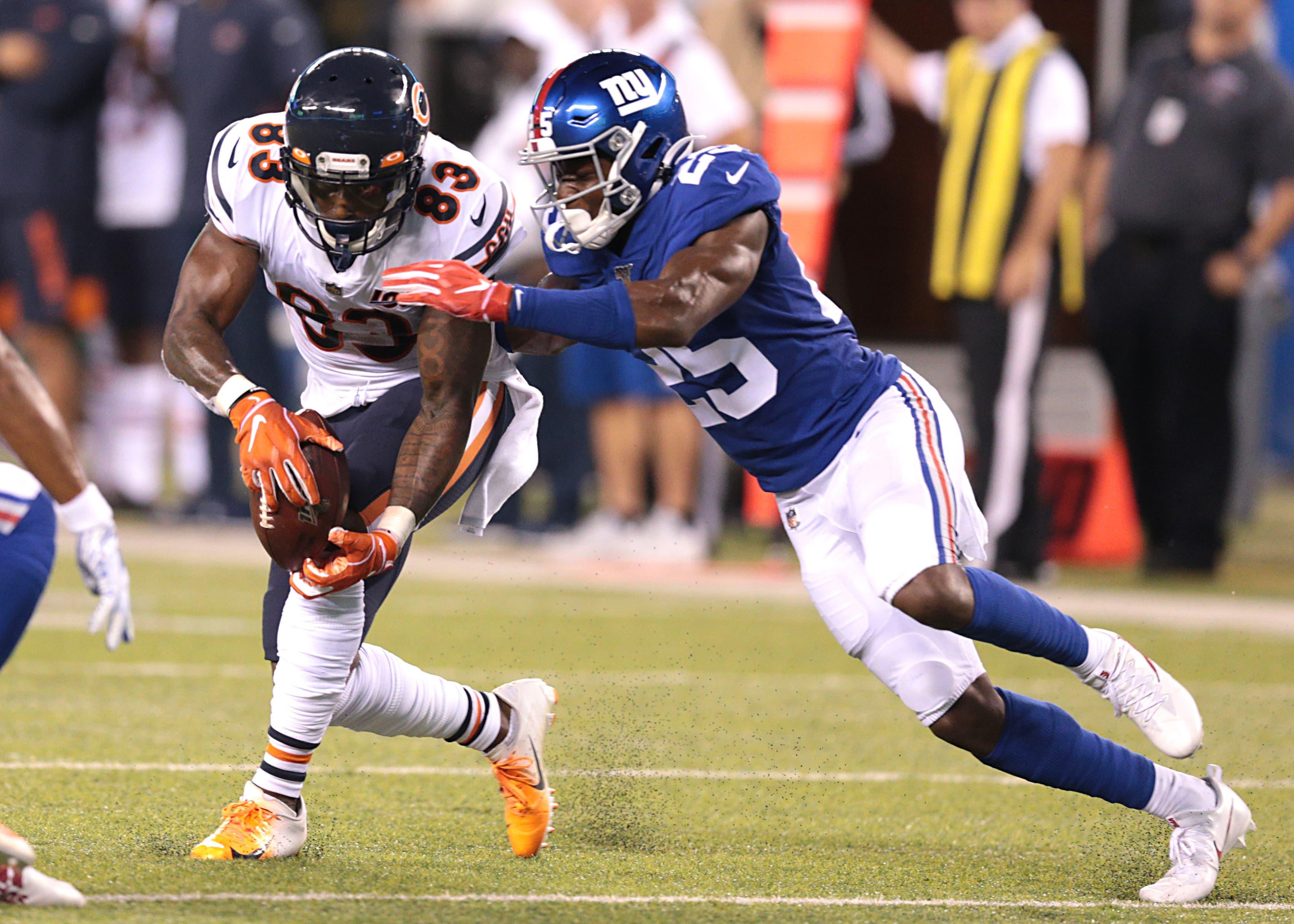 Aug 16, 2019; East Rutherford, NJ, USA; Chicago Bears wide receiver Javon Wims (83) catches a pass as New York Giants defensive back Corey Ballentine (25) tackles during the first half at MetLife Stadium. Mandatory Credit: Vincent Carchietta-USA TODAY Sports / Vincent Carchietta