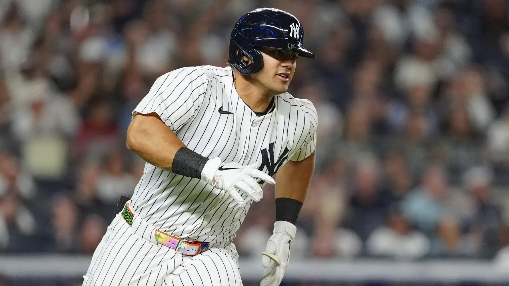 Sep 12, 2024; Bronx, New York, USA; New York Yankees left fielder Jasson Dominguez (89) runs out a single against the Boston Red Sox during the second inning at Yankee Stadium. / Gregory Fisher-Imagn Images