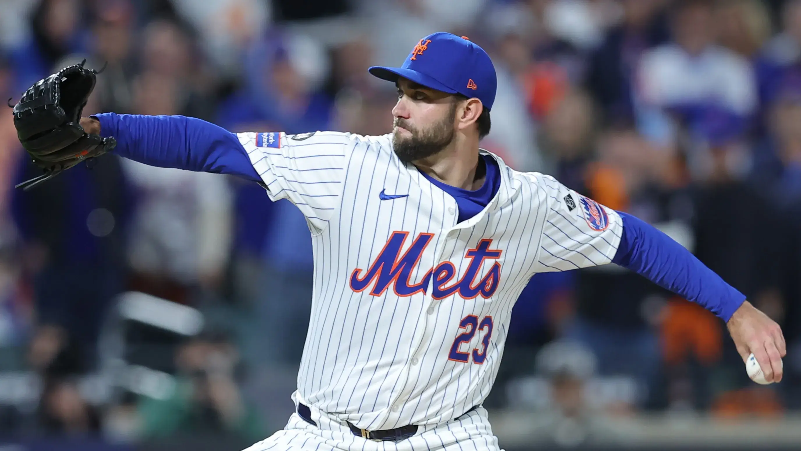 Oct 9, 2024; New York, New York, USA; New York Mets pitcher David Peterson (23) throws in the sixth inning against the Philadelphia Phillies in game four of the NLDS for the 2024 MLB Playoffs at Citi Field. / Brad Penner - Imagn Images