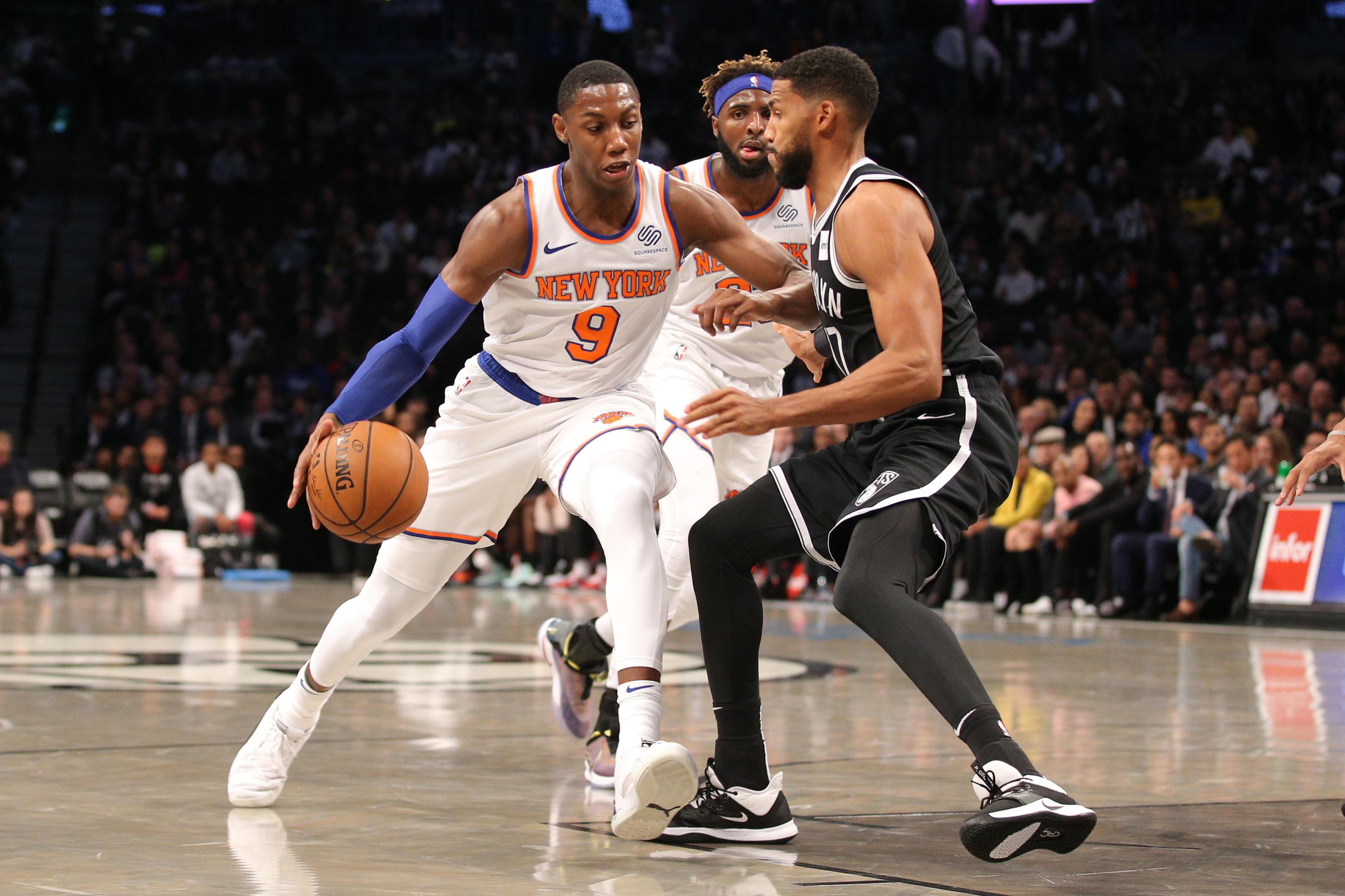 Oct 25, 2019; Brooklyn, NY, USA; New York Knicks small forward RJ Barrett (9) drives to the basket against Brooklyn Nets shooting guard Garrett Temple (17) during the first quarter at Barclays Center. Mandatory Credit: Brad Penner-USA TODAY Sports