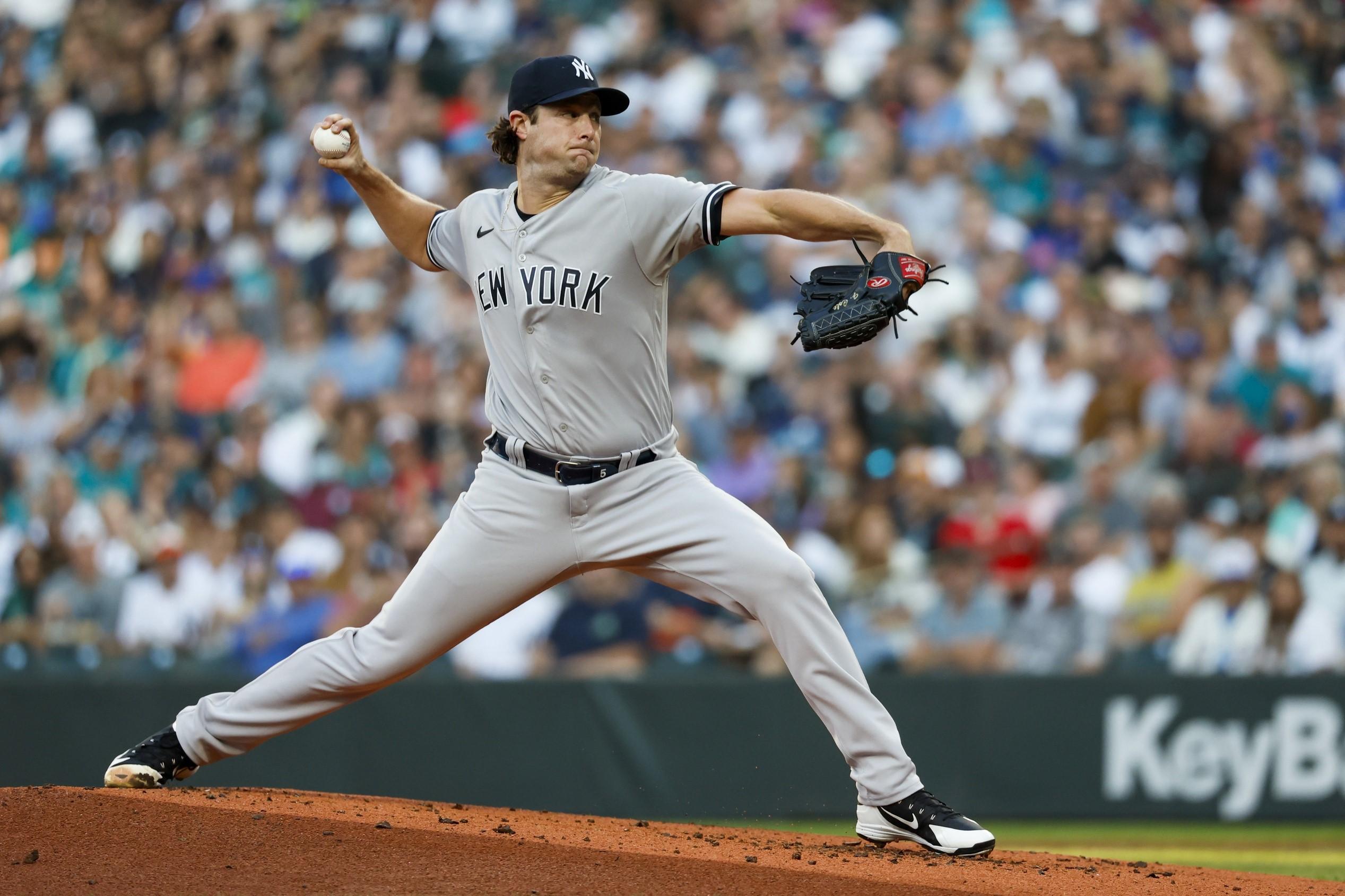 Aug 9, 2022; Seattle, Washington, USA; New York Yankees starting pitcher Gerrit Cole (45) throws against the Seattle Mariners during the first inning at T-Mobile Park.