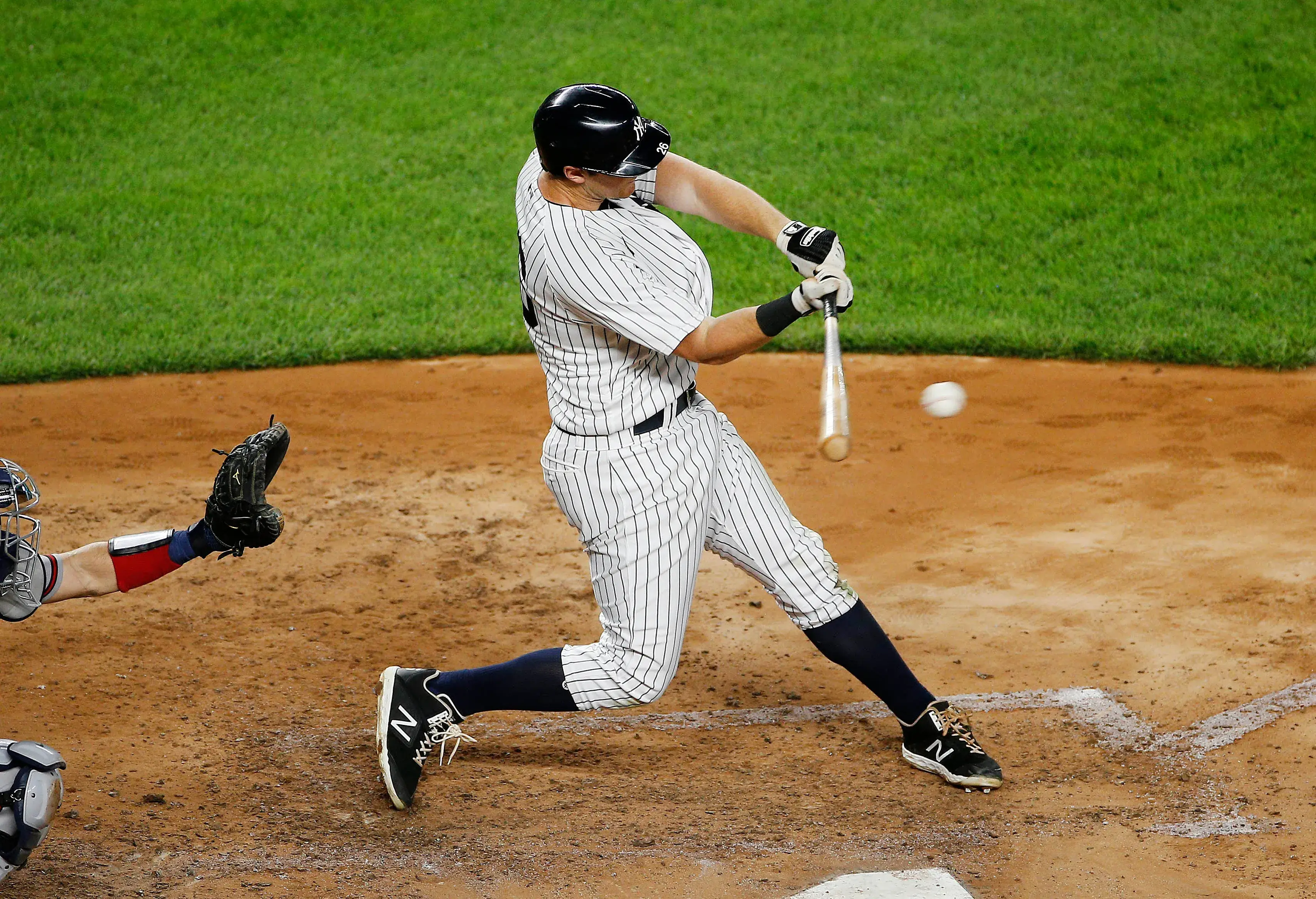 Aug 12, 2020; Bronx, New York, USA; New York Yankees second baseman DJ LeMahieu (26) singles against the Atlanta Braves during the fourth inning at Yankee Stadium. Mandatory Credit: Andy Marlin-USA TODAY Sports / © Andy Marlin-USA TODAY Sports