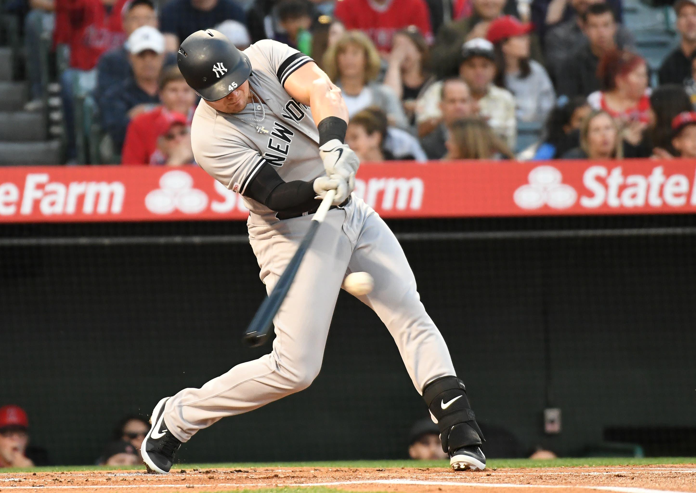 Apr 22, 2019; Anaheim, CA, USA; New York Yankees first baseman Luke Voit (45) hits a home run against the Los Angeles Angels in the first inning at Angel Stadium of Anaheim. Mandatory Credit: Richard Mackson-USA TODAY Sports / Richard Mackson