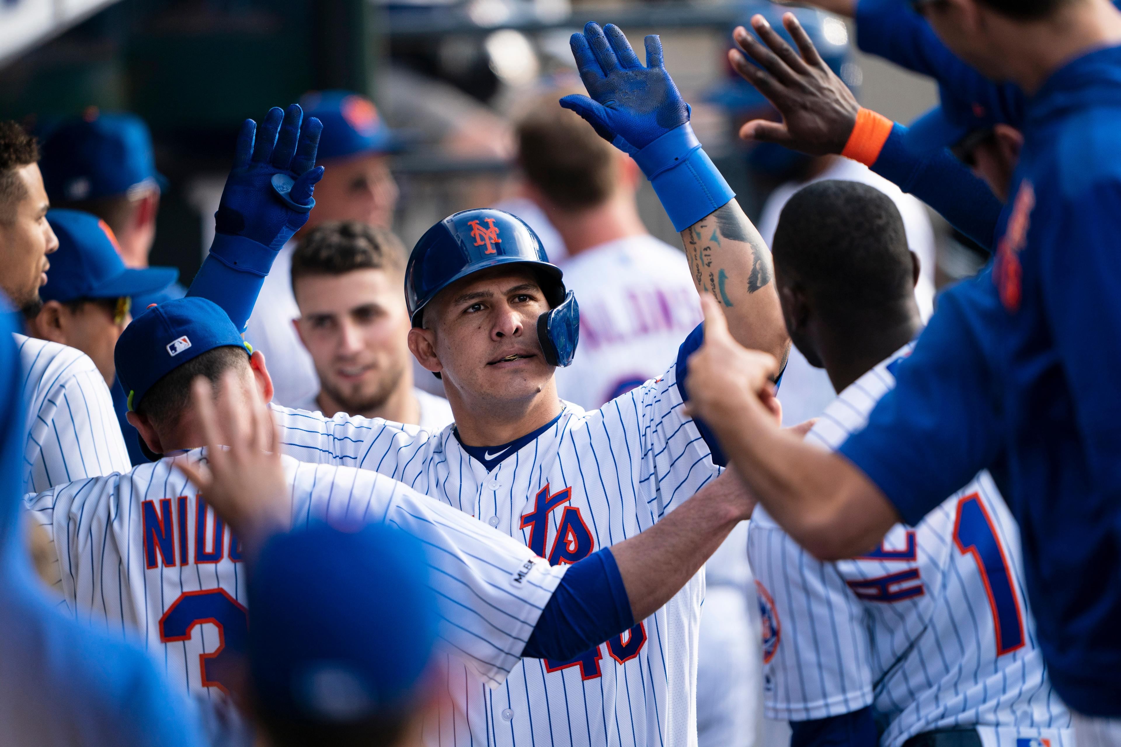 May 25, 2019; New York City, NY, USA; Teammates congratulate New York Mets catcher Wilson Ramos (40) after hitting a two run home run during the sixth inning against the Detriot Tigers at Citi Field. Mandatory Credit: Gregory J. Fisher-USA TODAY Sports