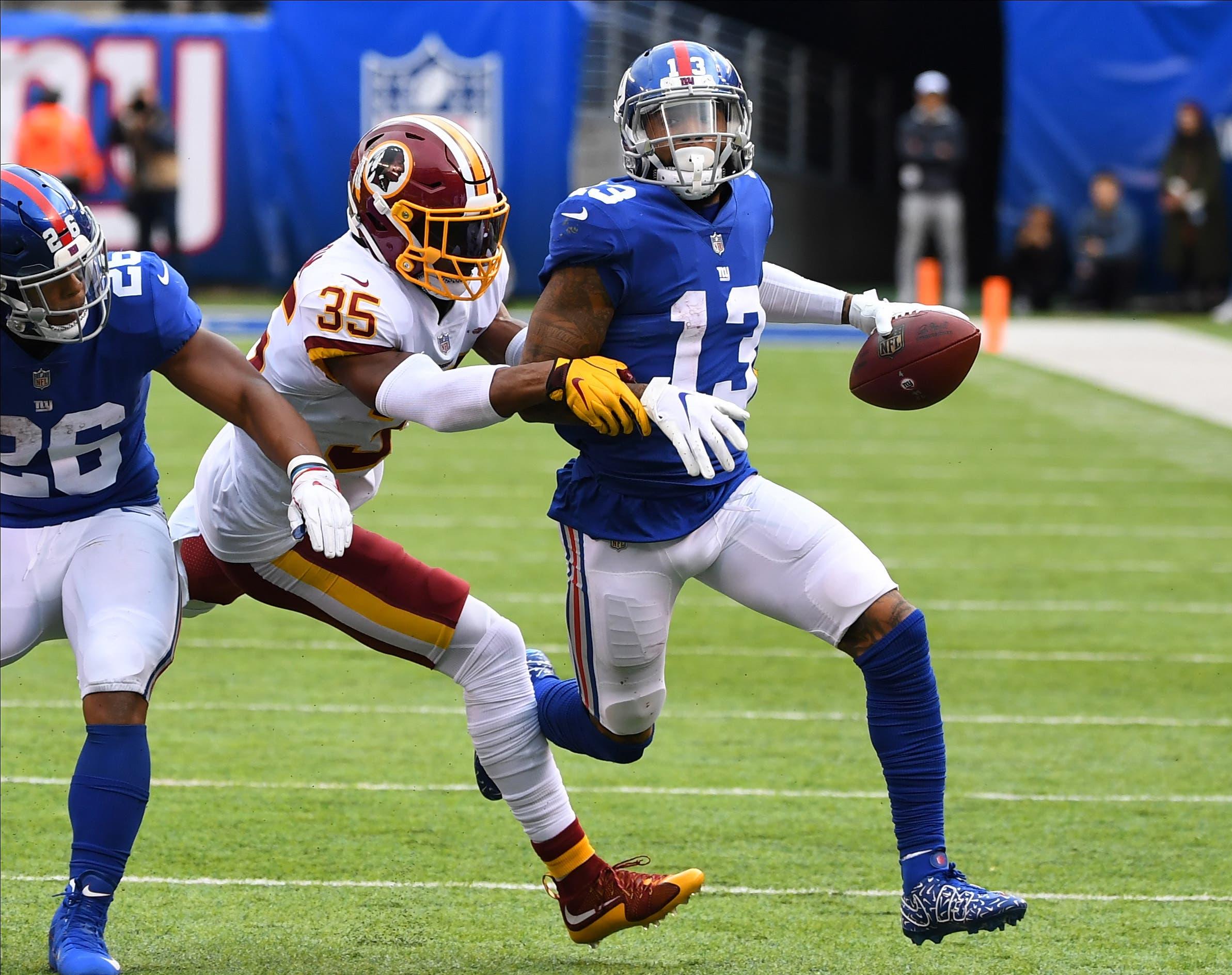 New York Giants wide receiver Odell Beckham Jr. on a long fourth-quarter reception chased by Washington Redskins safety Montae Nicholson at MetLife Stadium. / Robert Deutsch/USA TODAY Sports