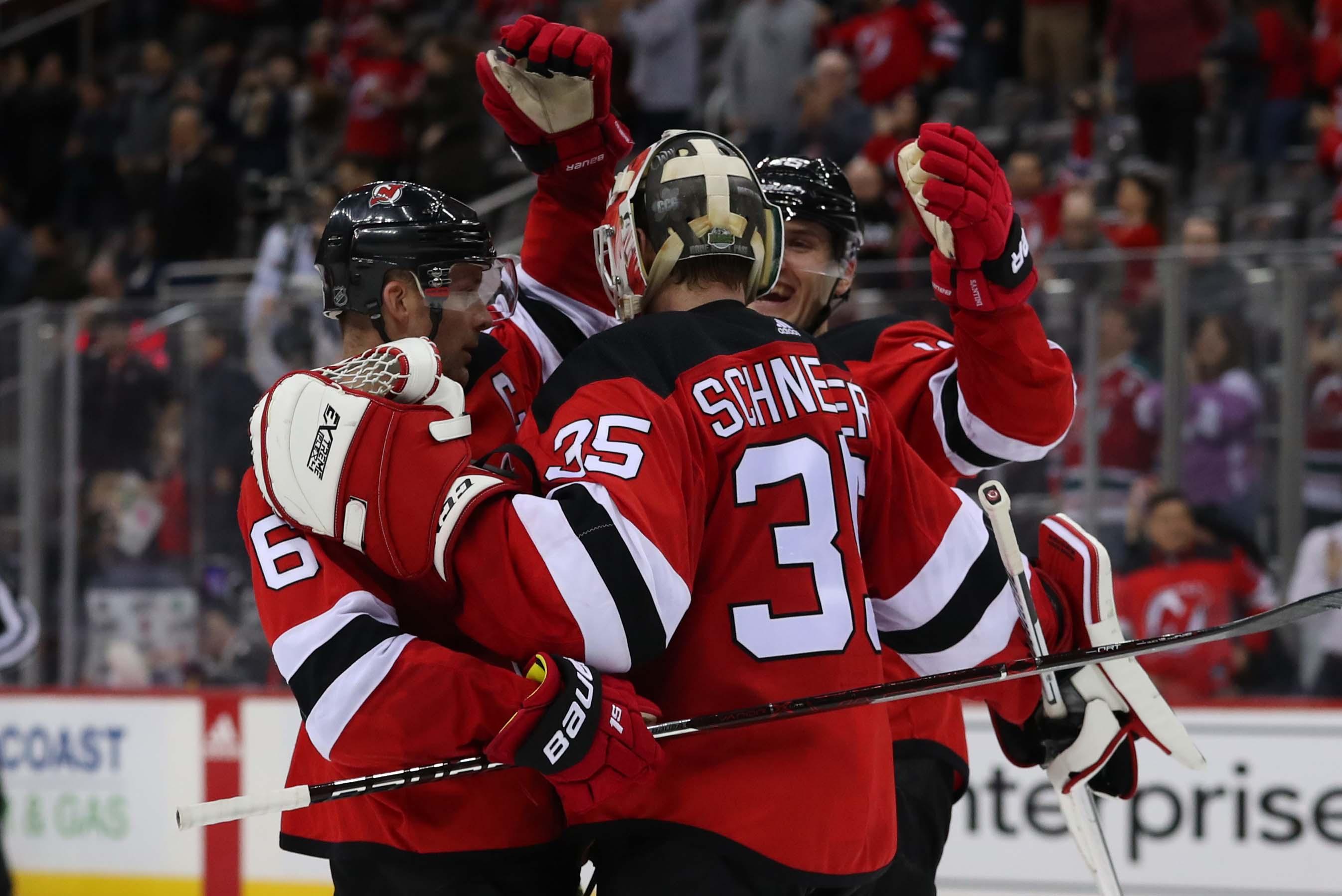 Feb 21, 2019; Newark, NJ, USA; The New Jersey Devils celebrate their 4-0 win over the Ottawa Senators at Prudential Center. Mandatory Credit: Ed Mulholland-USA TODAY Sports