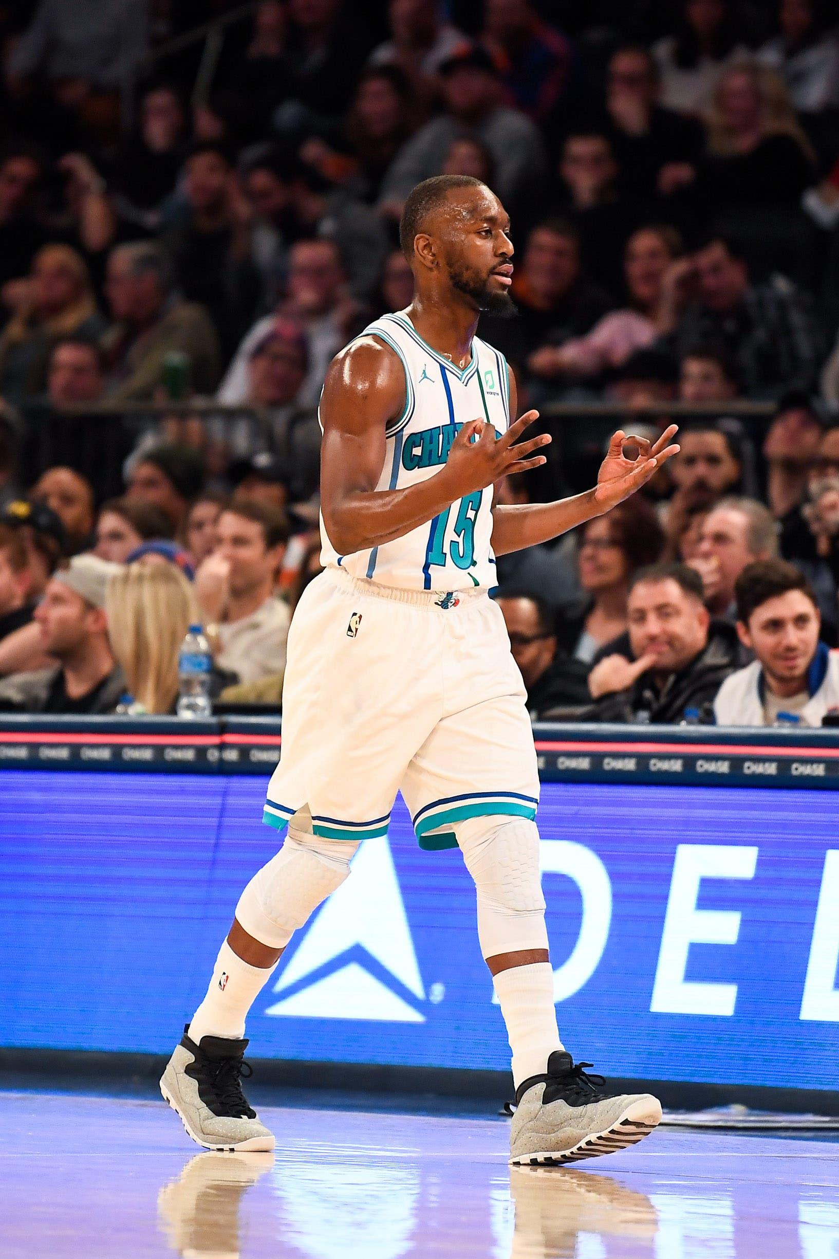 Charlotte Hornets guard Kemba Walker reacts in the third quarter after a 3-pointer against the New York Knicks at Madison Square Garden. / Catalina Fragoso/USA TODAY Sports