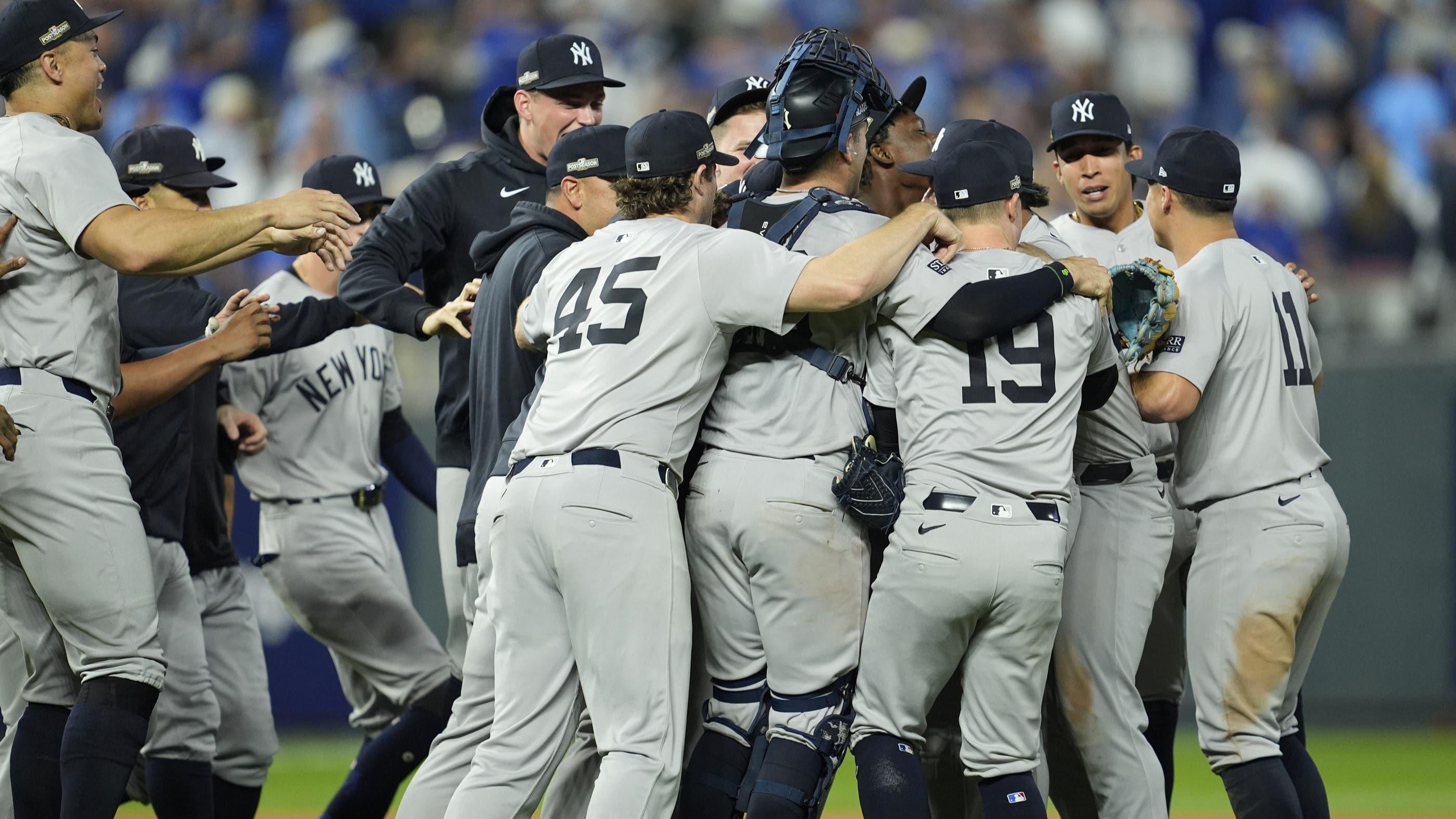 Oct 10, 2024; Kansas City, Missouri, USA; The New York Yankees celebrate a win over the Kansas City Royals during game four of the ALDS for the 2024 MLB Playoffs at Kauffman Stadium. / Jay Biggerstaff-Imagn Images