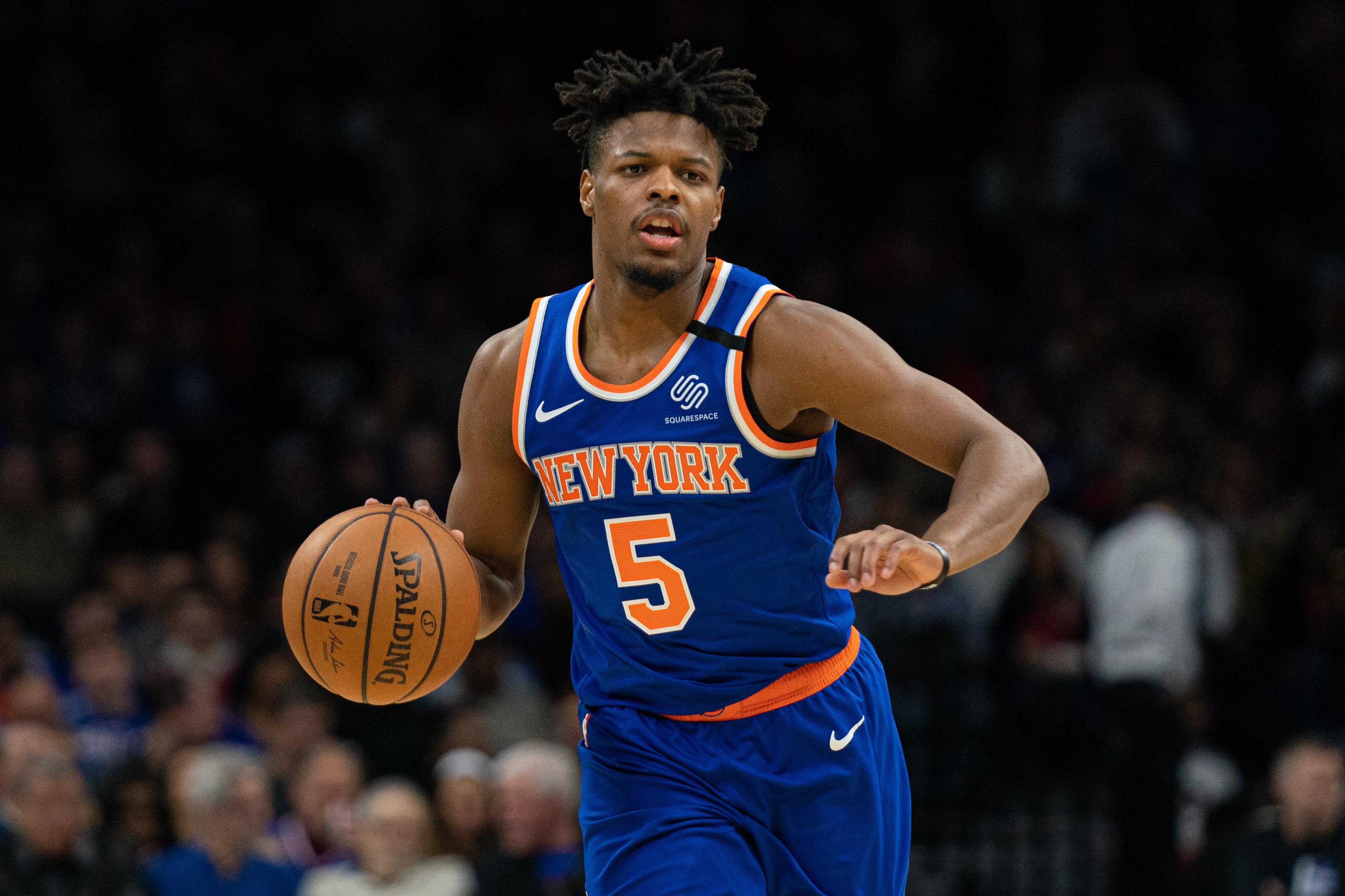 Feb 27, 2020; Philadelphia, Pennsylvania, USA; New York Knicks guard Dennis Smith Jr. (5) dribbles the ball against the Philadelphia 76ers during the second quarter at Wells Fargo Center. Mandatory Credit: Bill Streicher-USA TODAY Sports