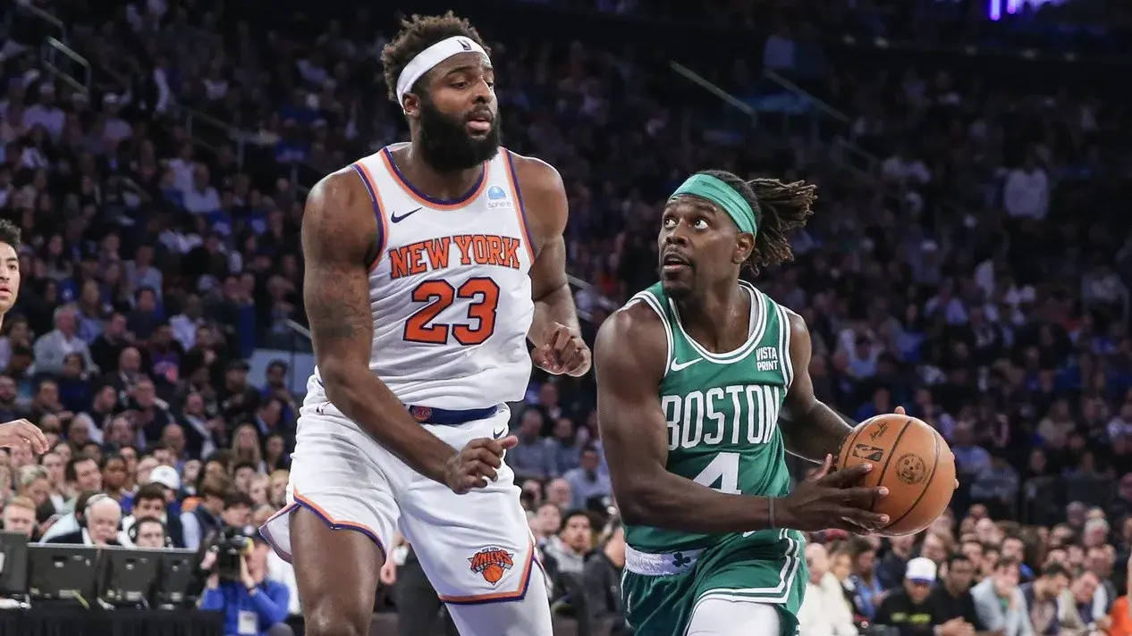 Boston Celtics guard Jrue Holiday (4) looks to drive past New York Knicks center Mitchell Robinson (23) in the second quarter at Madison Square Garden. / Wendell Cruz-USA TODAY Sports
