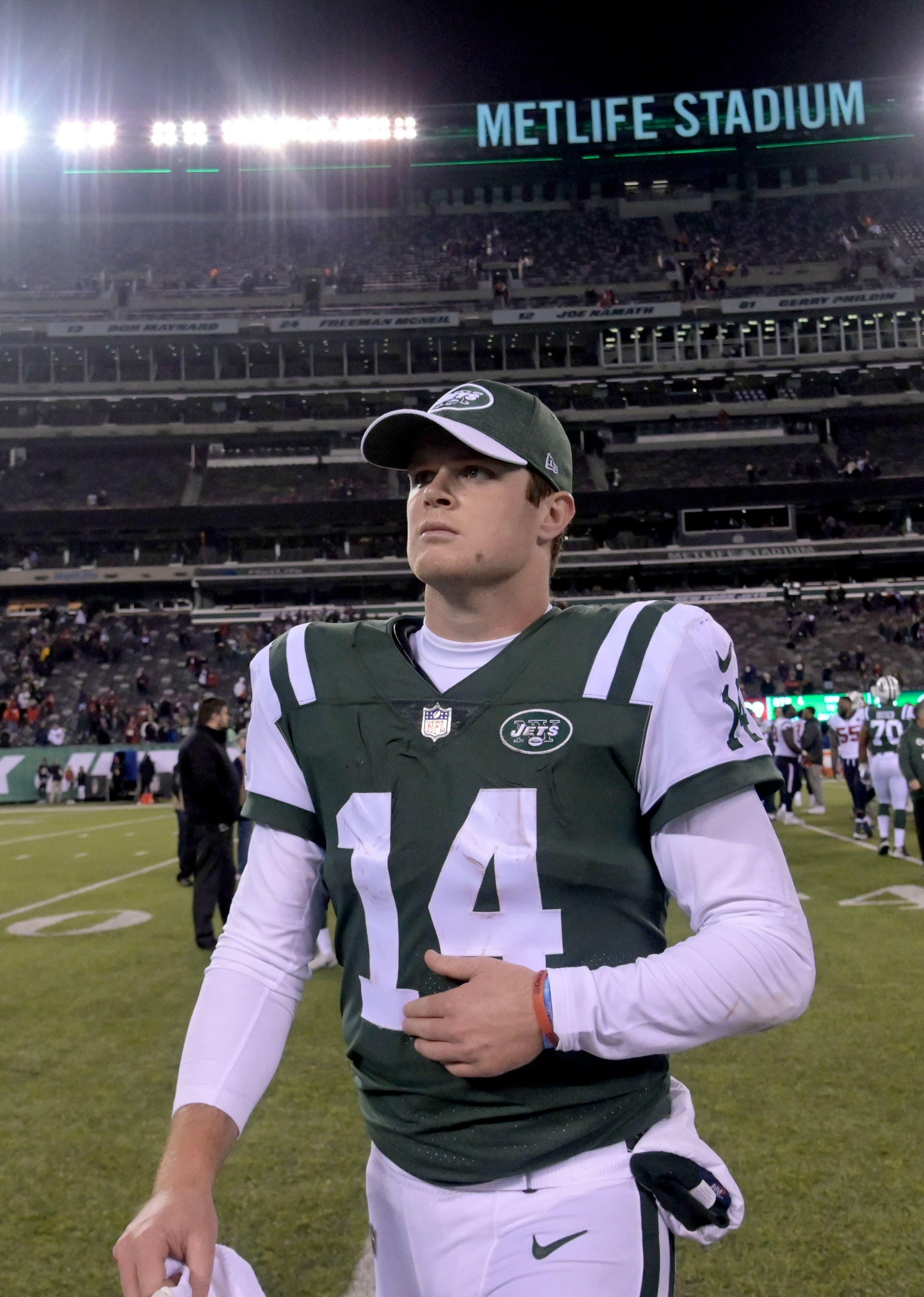 Dec 15, 2018; East Rutherford, NJ, USA; New York Jets quarterback Sam Darnold (14) leaves the field after losing to the Houston Texans at MetLife Stadium. The Texans defeated the Jets 29-22. Mandatory Credit: Kirby Lee-USA TODAY Sports / Kirby Lee