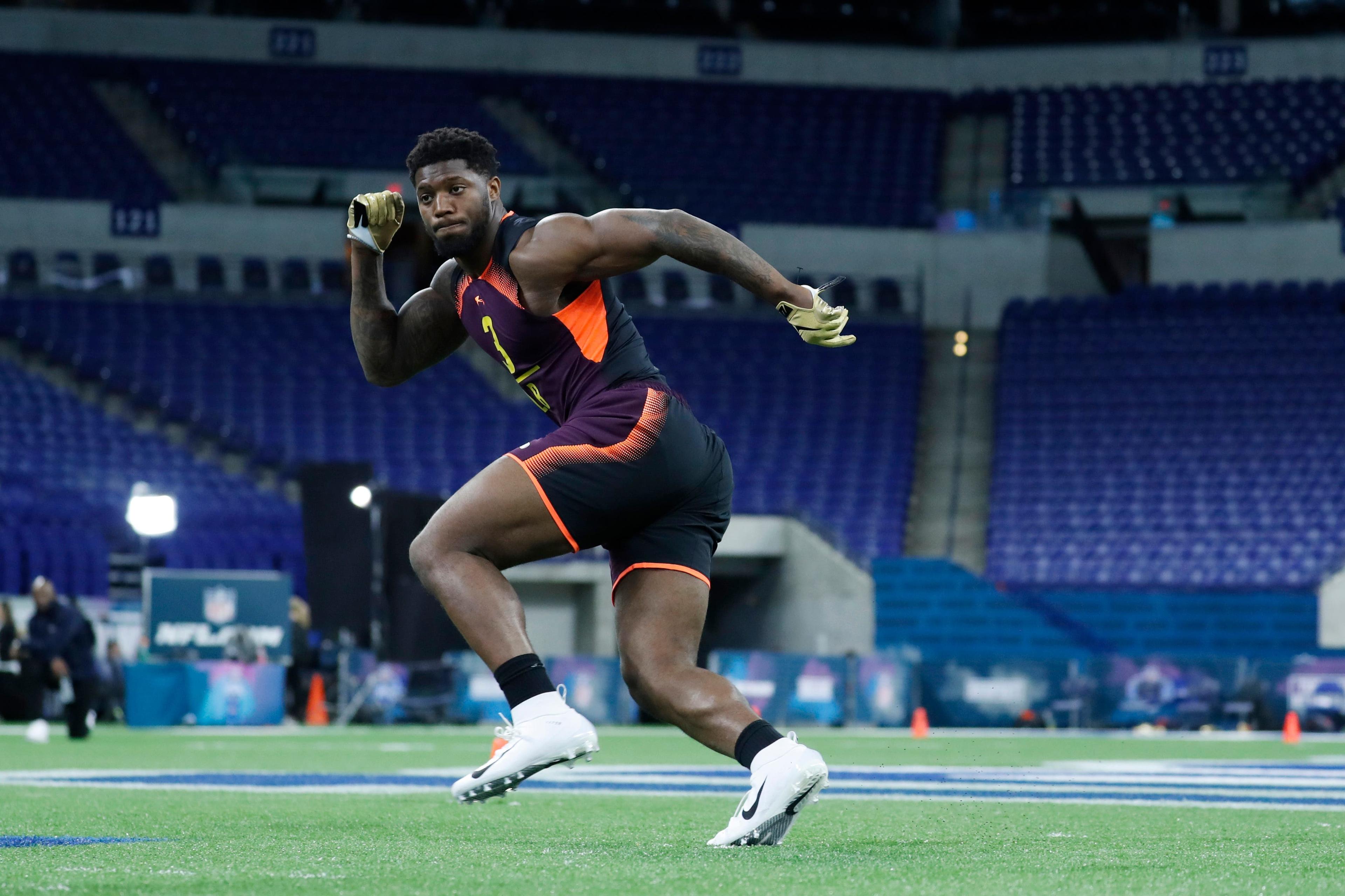 Mar 3, 2019; Indianapolis, IN, USA; Kentucky linebacker Josh Allen (LB03) goes through workout drills during the 2019 NFL Combine at Lucas Oil Stadium. Mandatory Credit: Brian Spurlock-USA TODAY Sports / Brian Spurlock