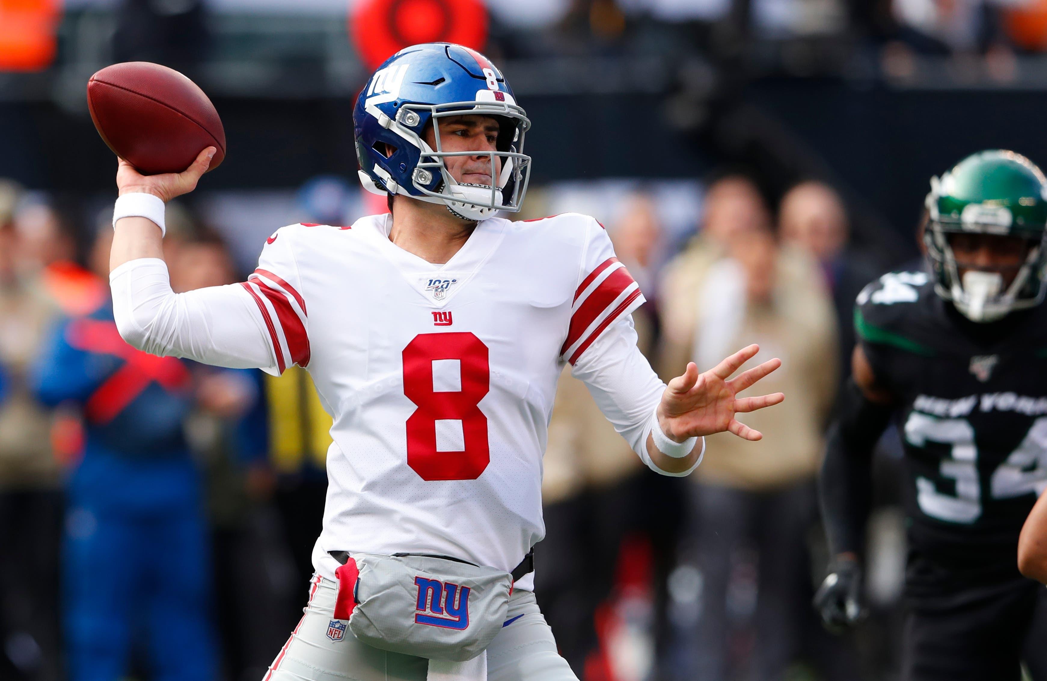 Nov 10, 2019; East Rutherford, NJ, USA; New York Giants quarterback Daniel Jones (8) throws a pass against the New York Jets during the first quarter at MetLife Stadium. Mandatory Credit: Noah K. Murray-USA TODAY Sports / Noah K. Murray