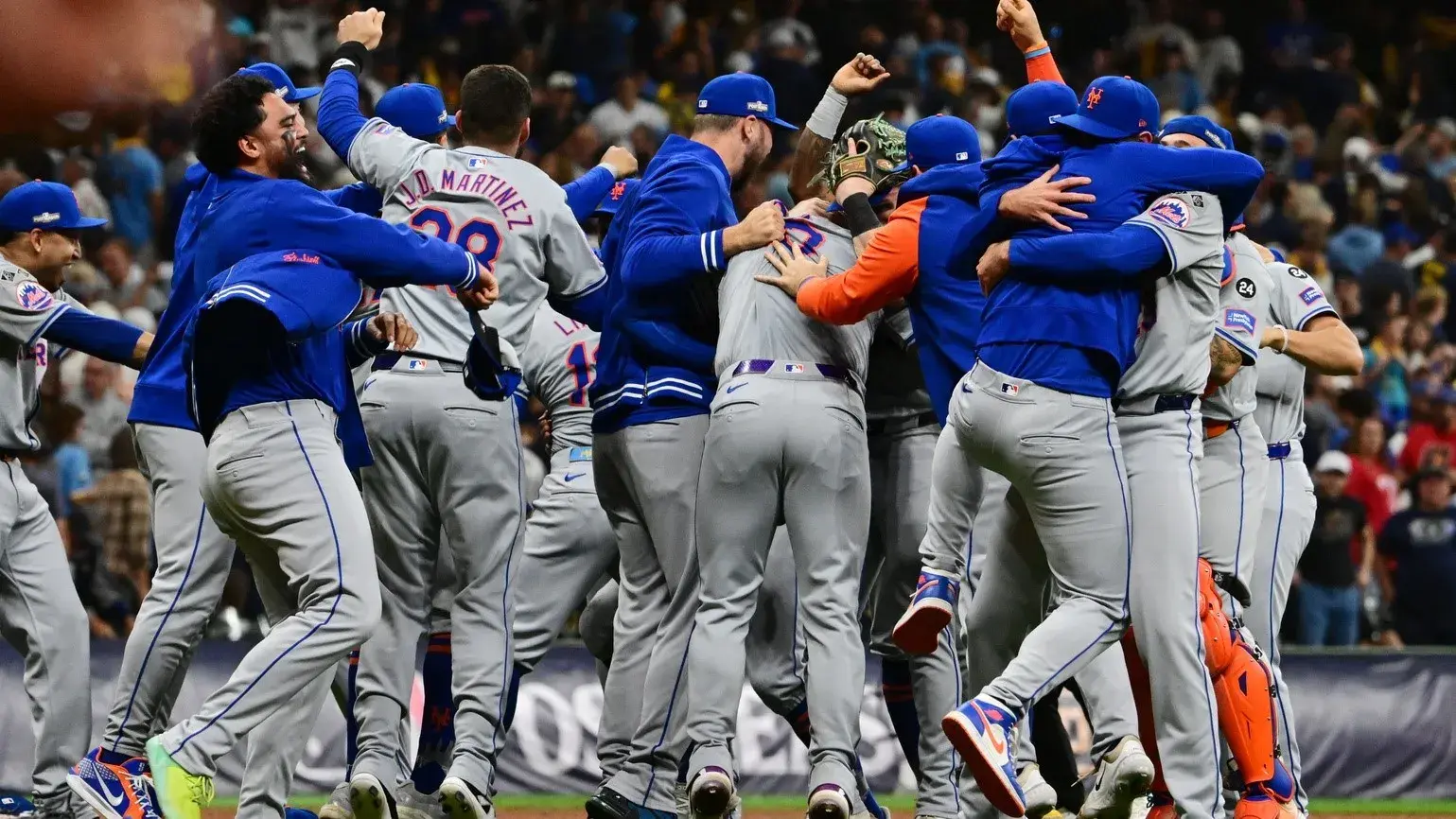 Oct 3, 2024; Milwaukee, Wisconsin, USA; The New York Mets celebrate after defeating the Milwaukee Brewers in game three of the Wildcard round for the 2024 MLB Playoffs at American Family Field. / Benny Sieu-Imagn Images