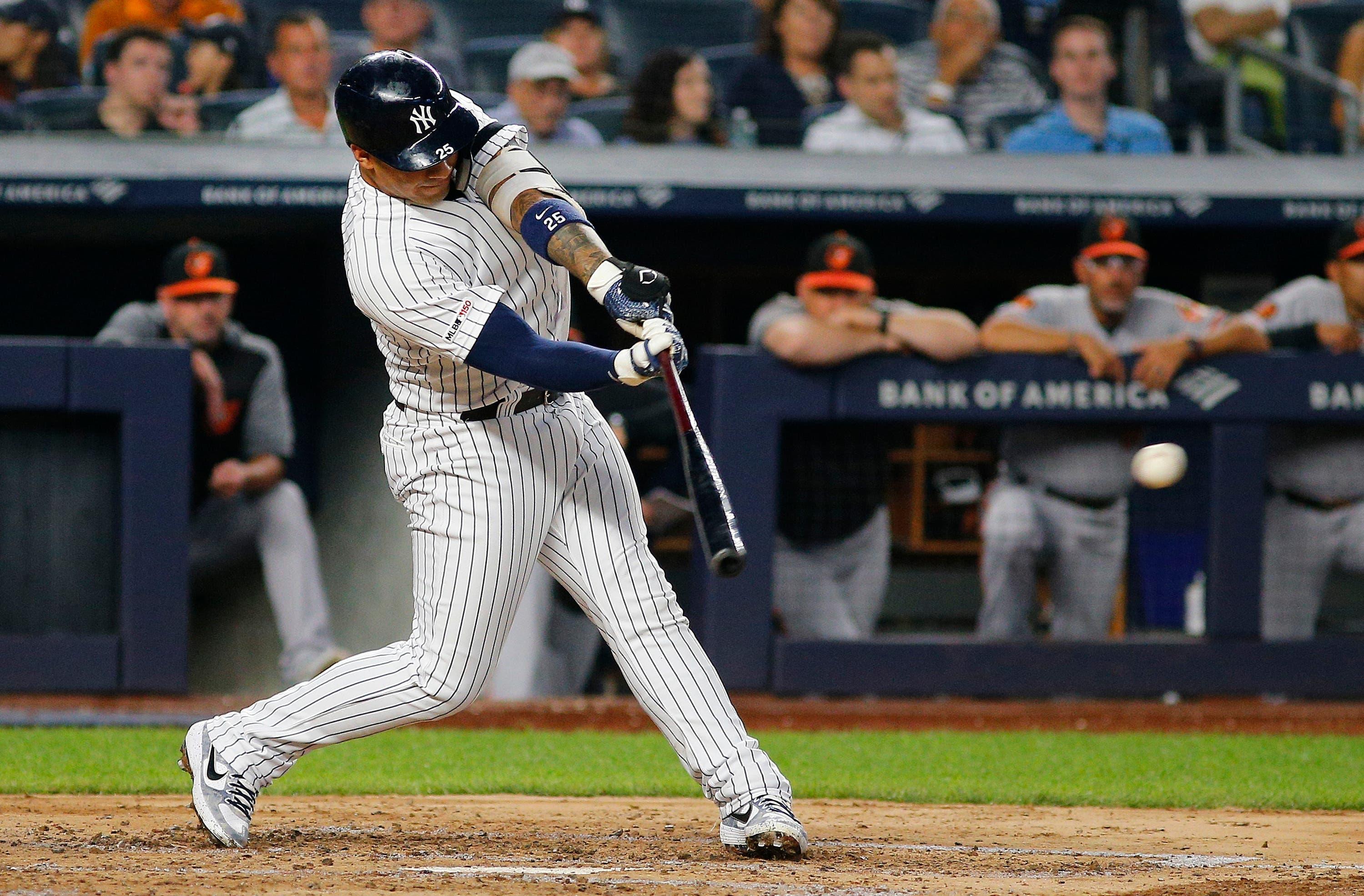 Aug 13, 2019; Bronx, NY, USA; New York Yankees second baseman Gleyber Torres (25) singles against the Baltimore Orioles during the third inning at Yankee Stadium. Mandatory Credit: Andy Marlin-USA TODAY Sports / Andy Marlin