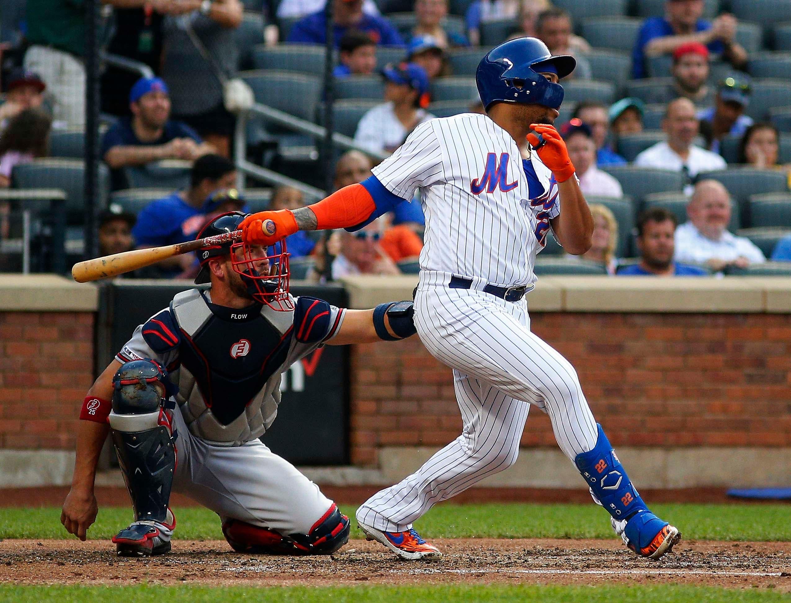 New York Mets first baseman Dominic Smith hits a solo home run against the Atlanta Braves during the third inning at Citi Field. / Andy Marlin/USA TODAY Sports