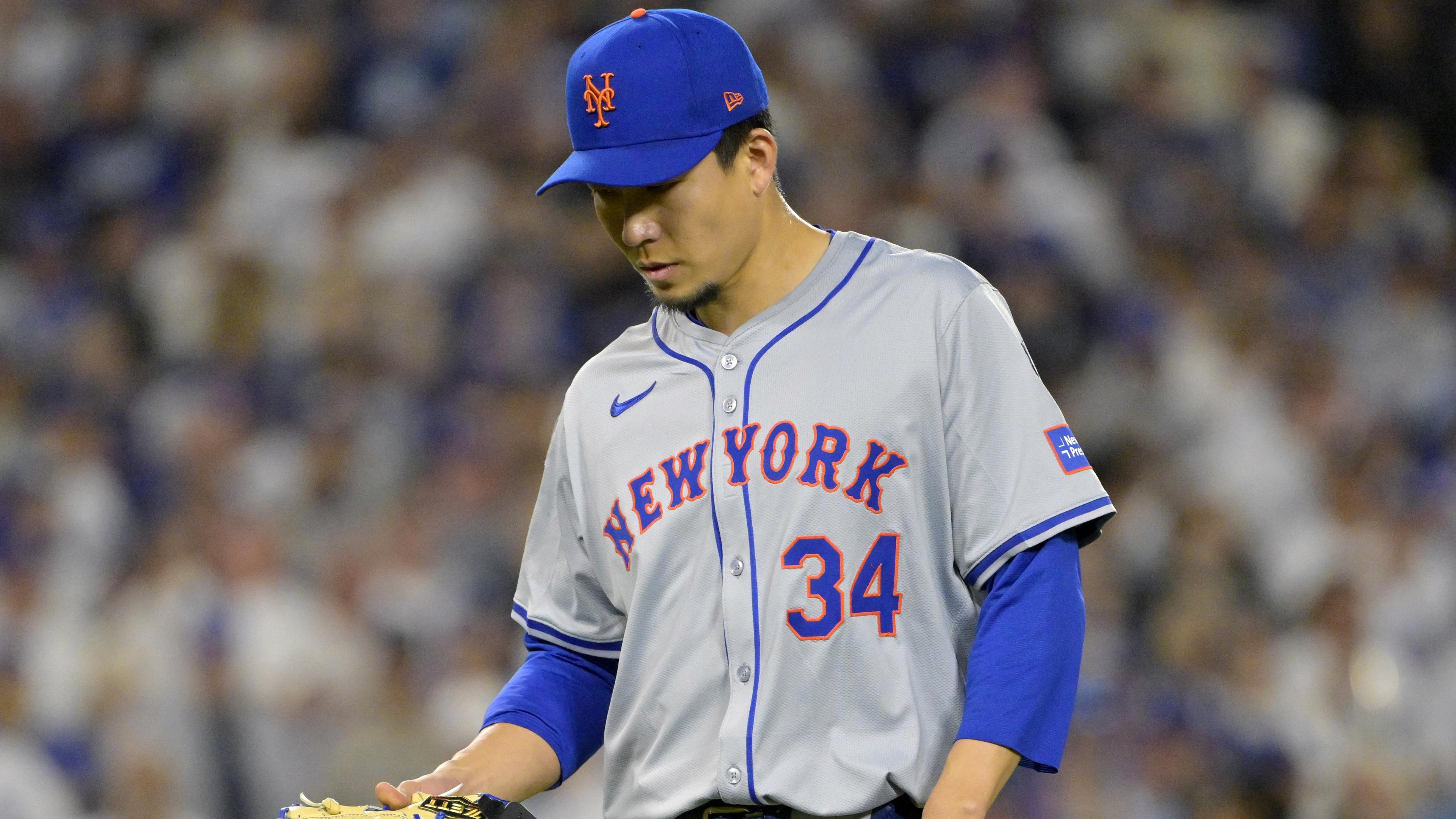 New York Mets pitcher Kodai Senga (34) walks to the dugout after being relieved in the eighth inning against the Los Angeles Dodgers during game six of the NLCS for the 2024 MLB playoffs at Dodger Stadium