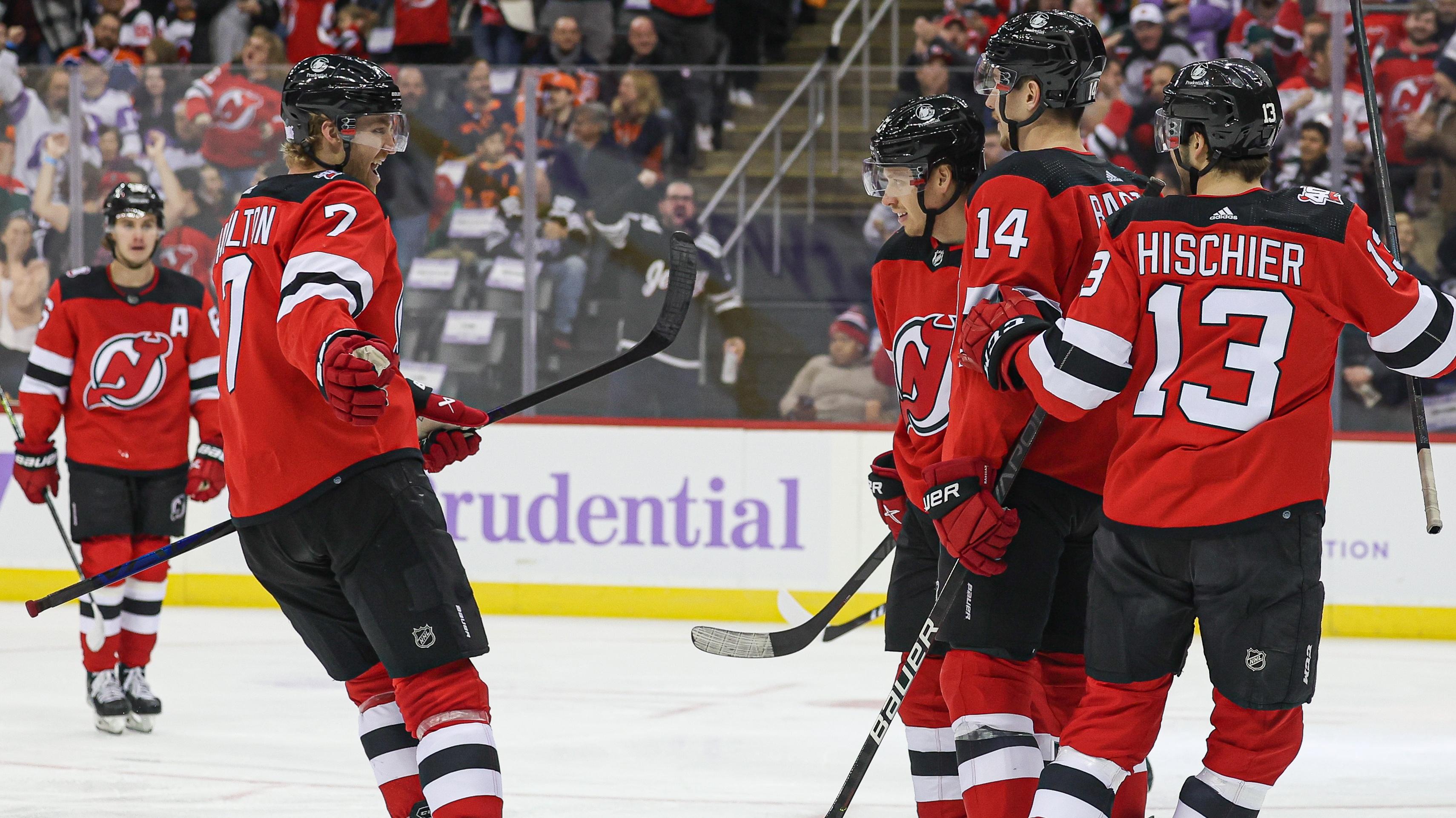 New Jersey Devils left wing Jesper Bratt (63) celebrates his goal with teammates during the first period