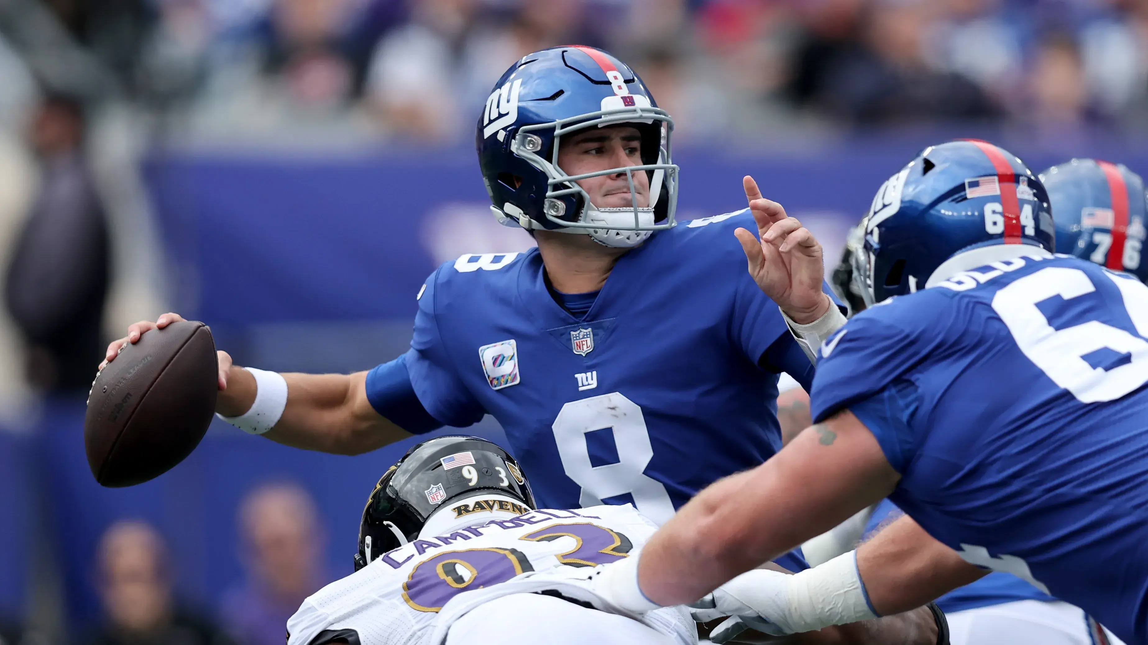 Oct 16, 2022; East Rutherford, New Jersey, USA; New York Giants quarterback Daniel Jones (8) drops back to pass against the Baltimore Ravens during the first quarter at MetLife Stadium. Mandatory Credit: Brad Penner-USA TODAY Sports / © Brad Penner-USA TODAY Sports