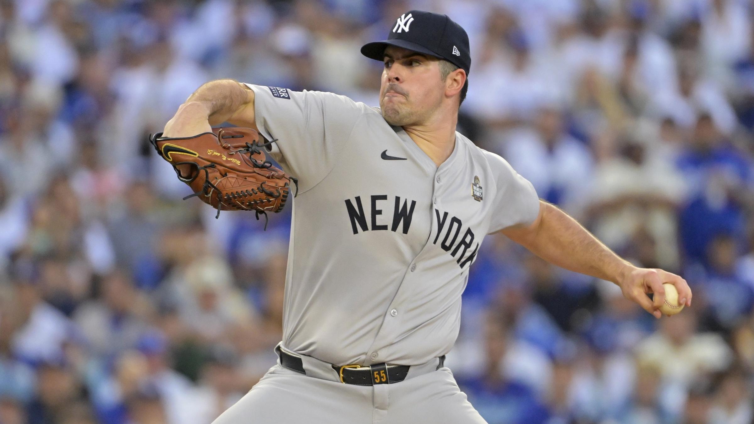 New York Yankees pitcher Carlos Rodon (55) pitches in the first inning against the Los Angeles Dodgers during game two of the 2024 MLB World Series at Dodger Stadium.